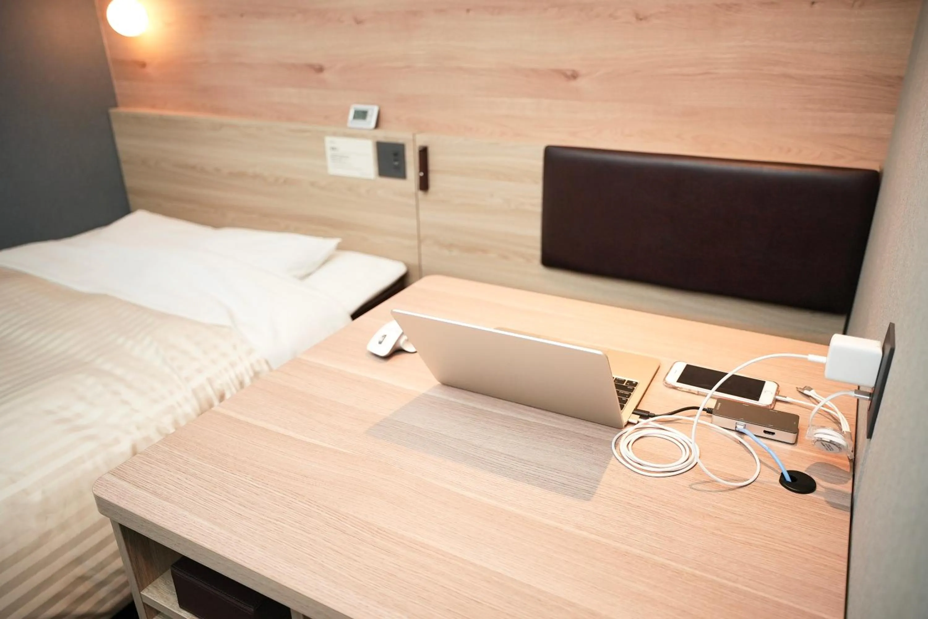 Bed in Super Hotel Utsunomiya