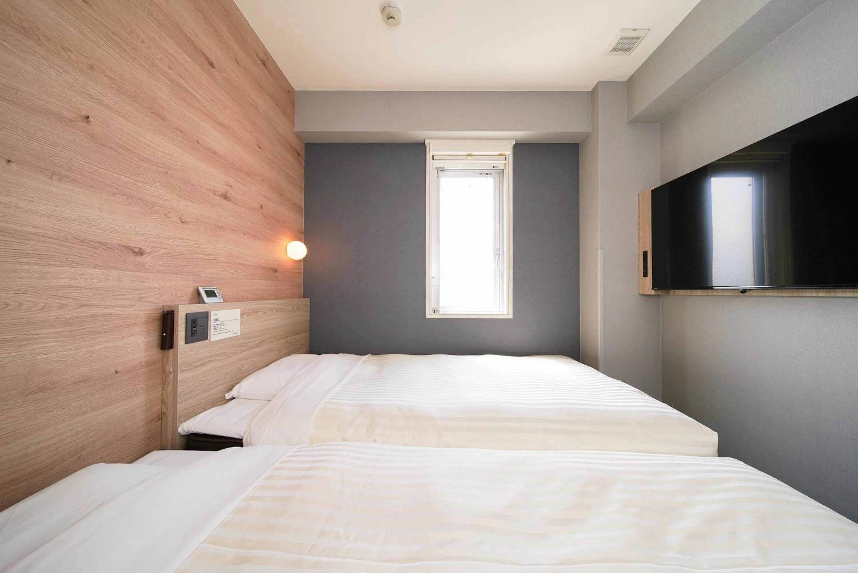 Bed in Super Hotel Utsunomiya