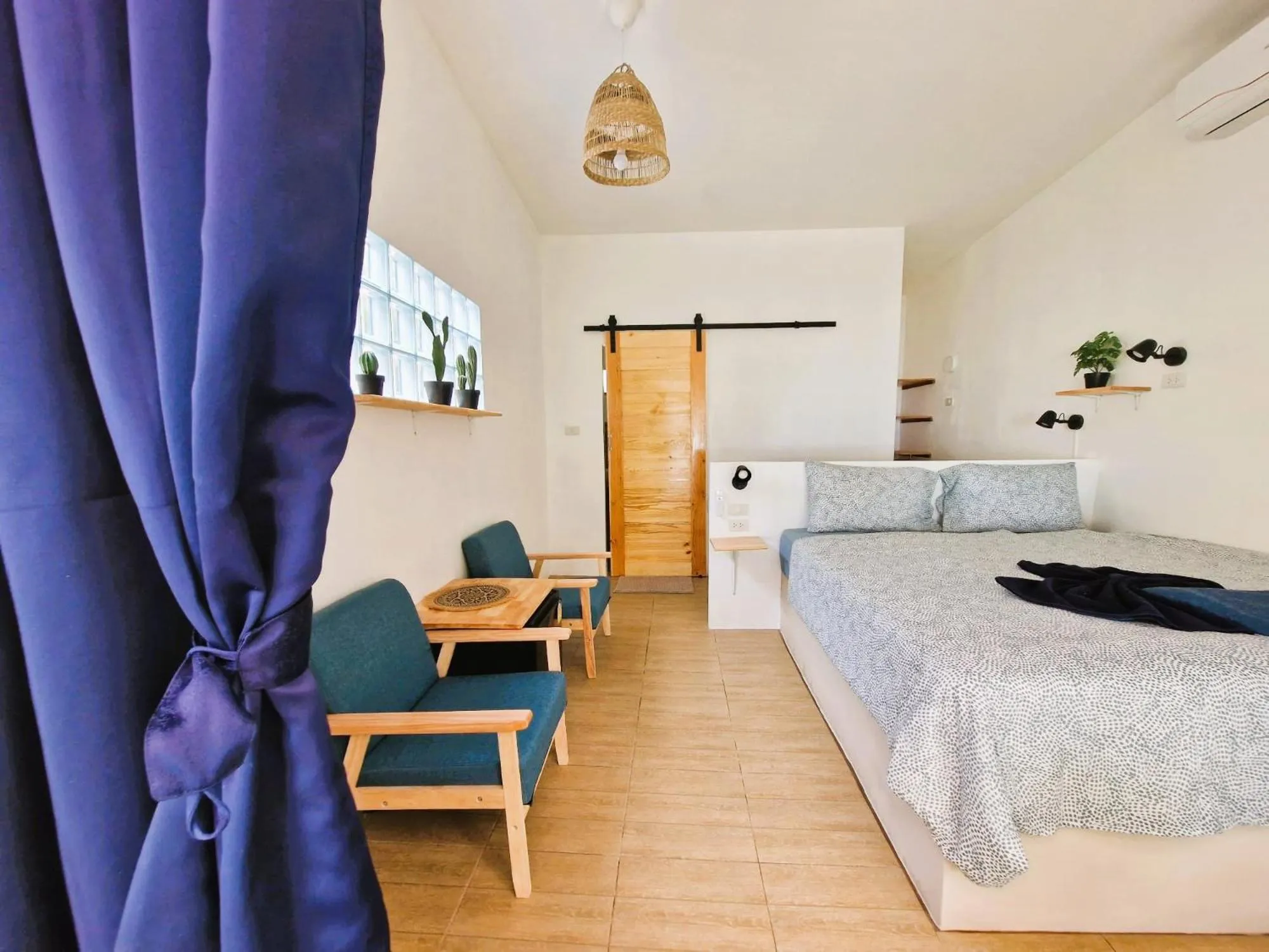 Photo of the whole room, Bed in Secret Beach Bungalows