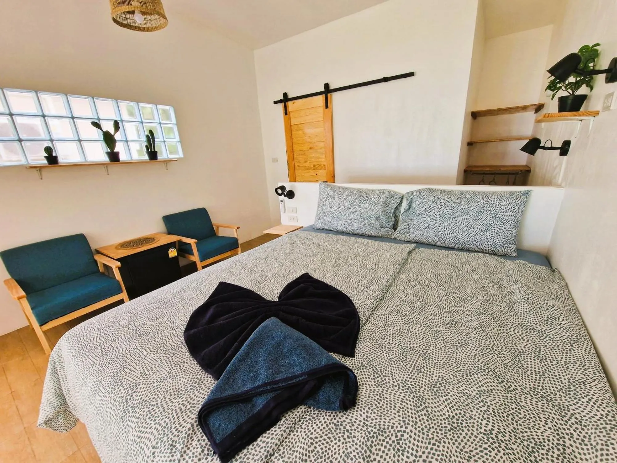 Photo of the whole room, Bed in Secret Beach Bungalows