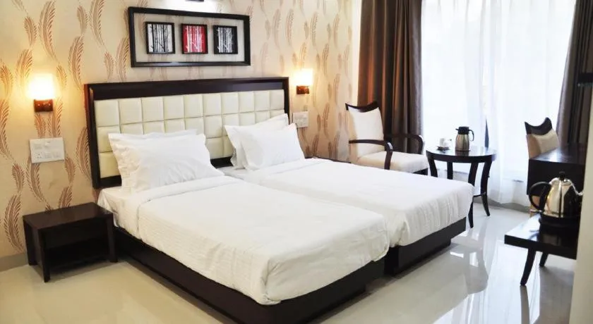 Photo of the whole room, Bed in Krishna Inn