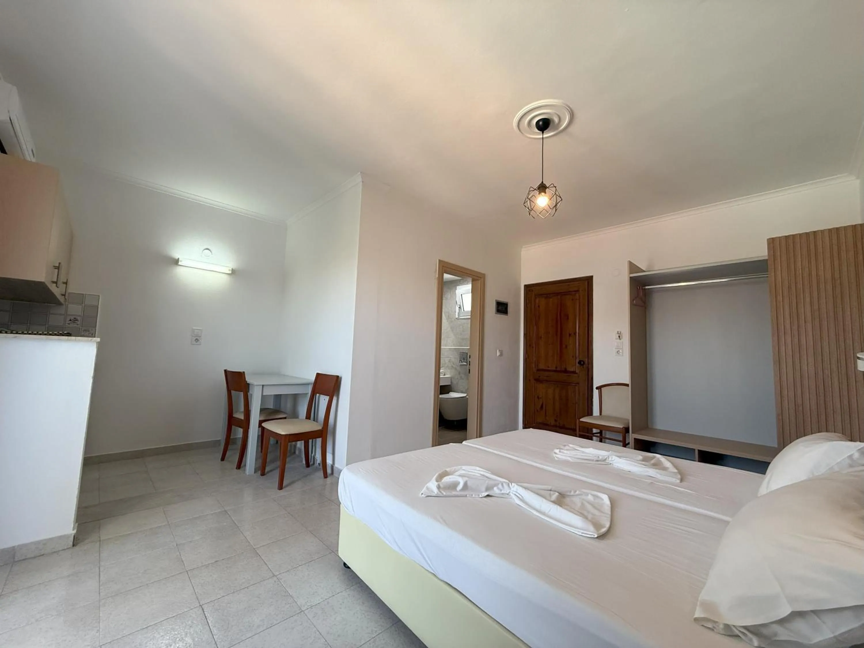 Bed in Elga Hotel & apartments