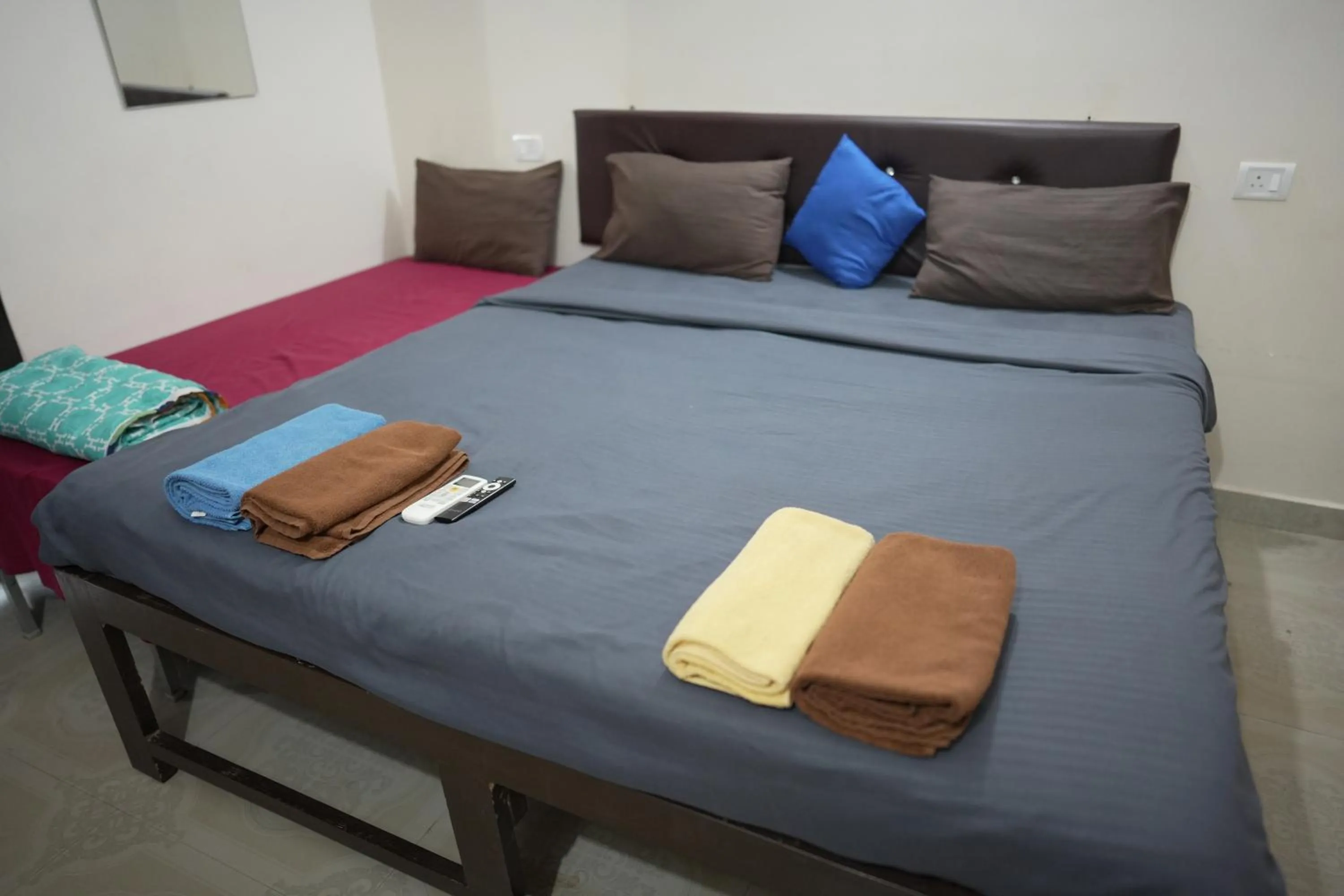 Bed in Hotel Saffron Baga