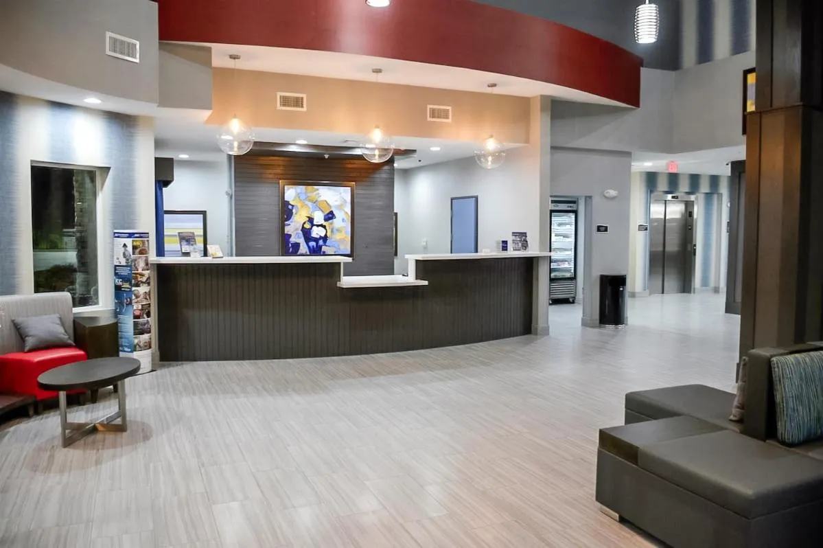 Lobby or reception in Del-Mar Airport Inn & Suites
