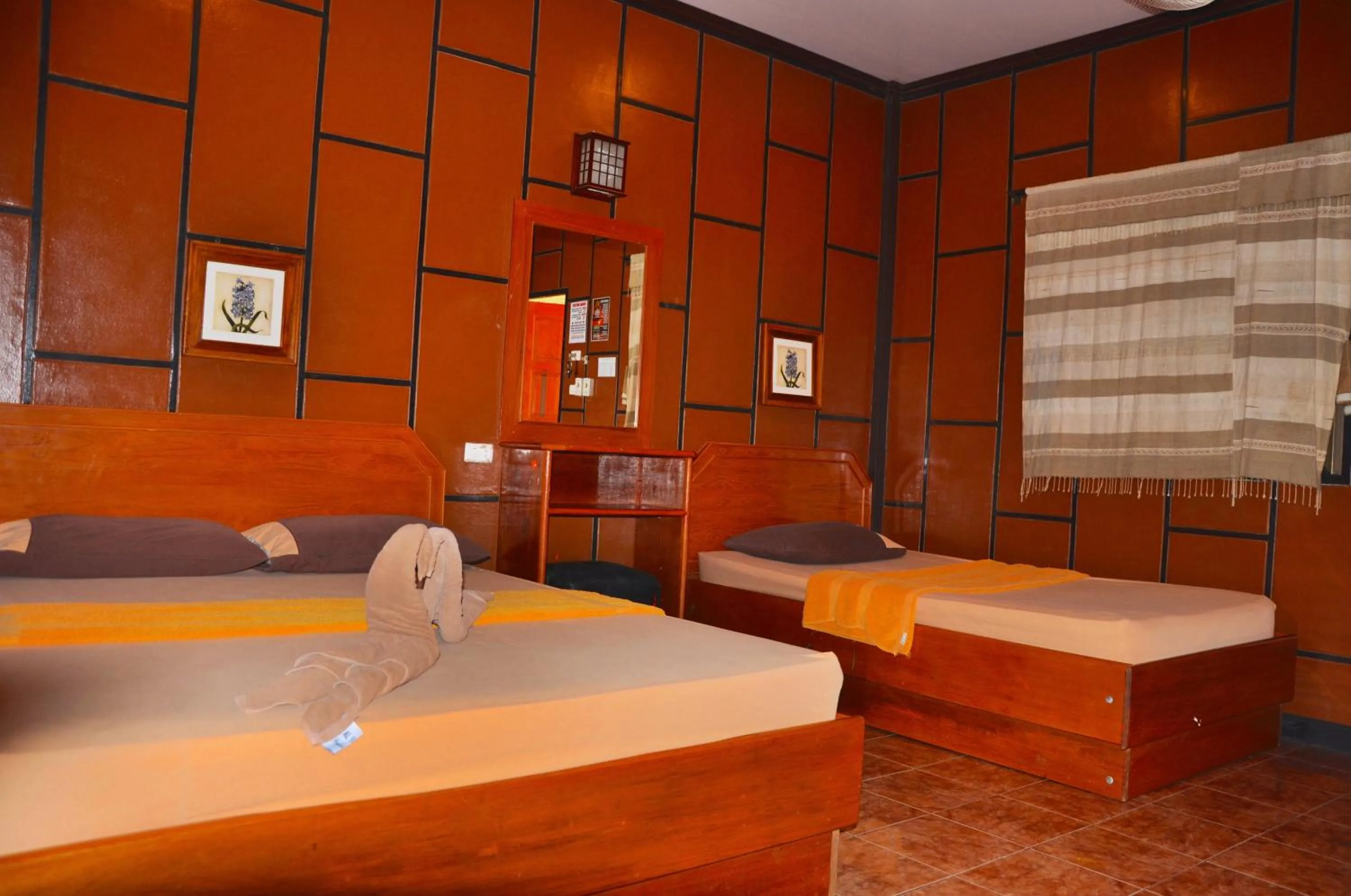 Bedroom in Coral Bungalows