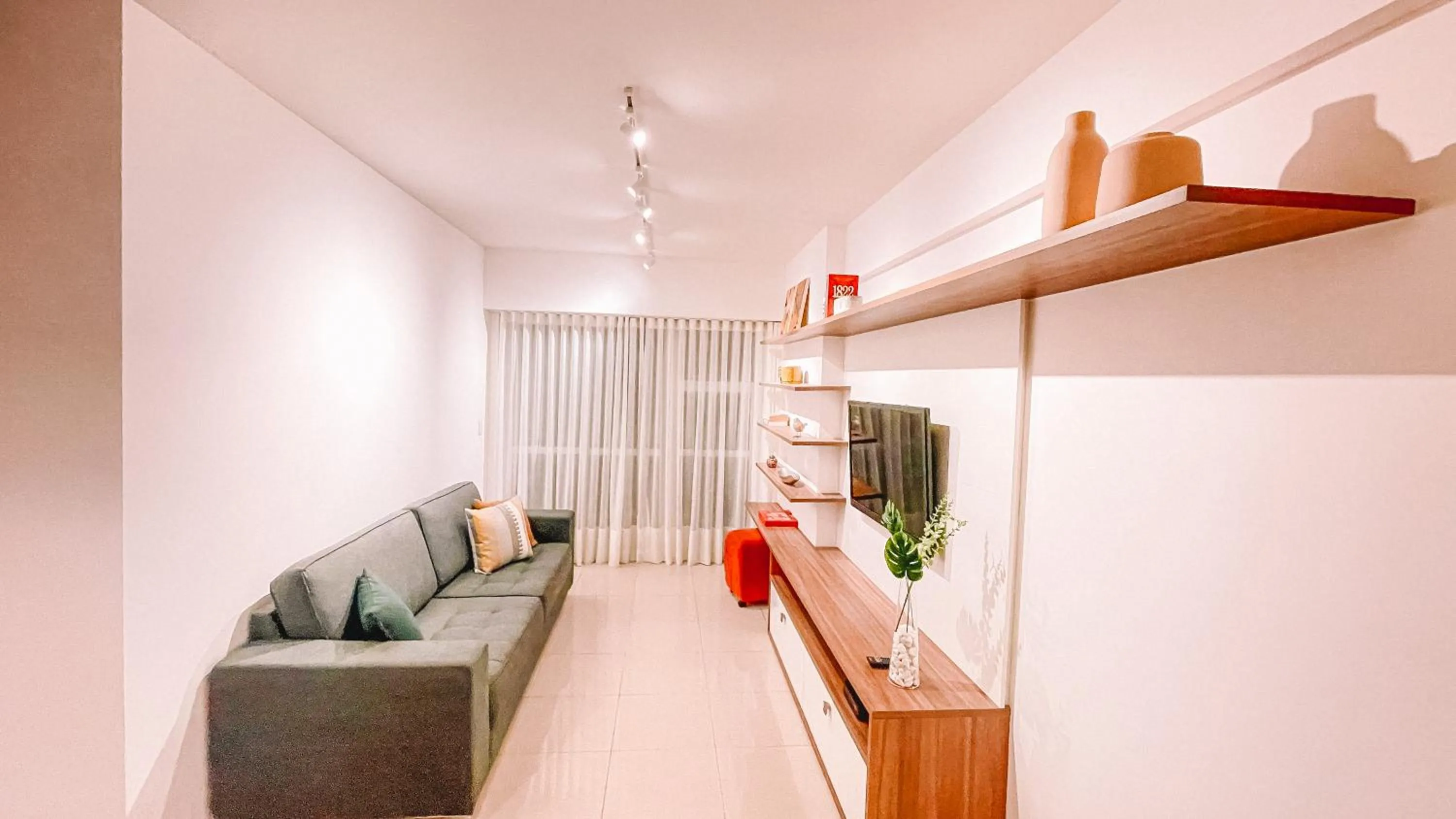 Communal lounge/ TV room in Barra para casais e famílias