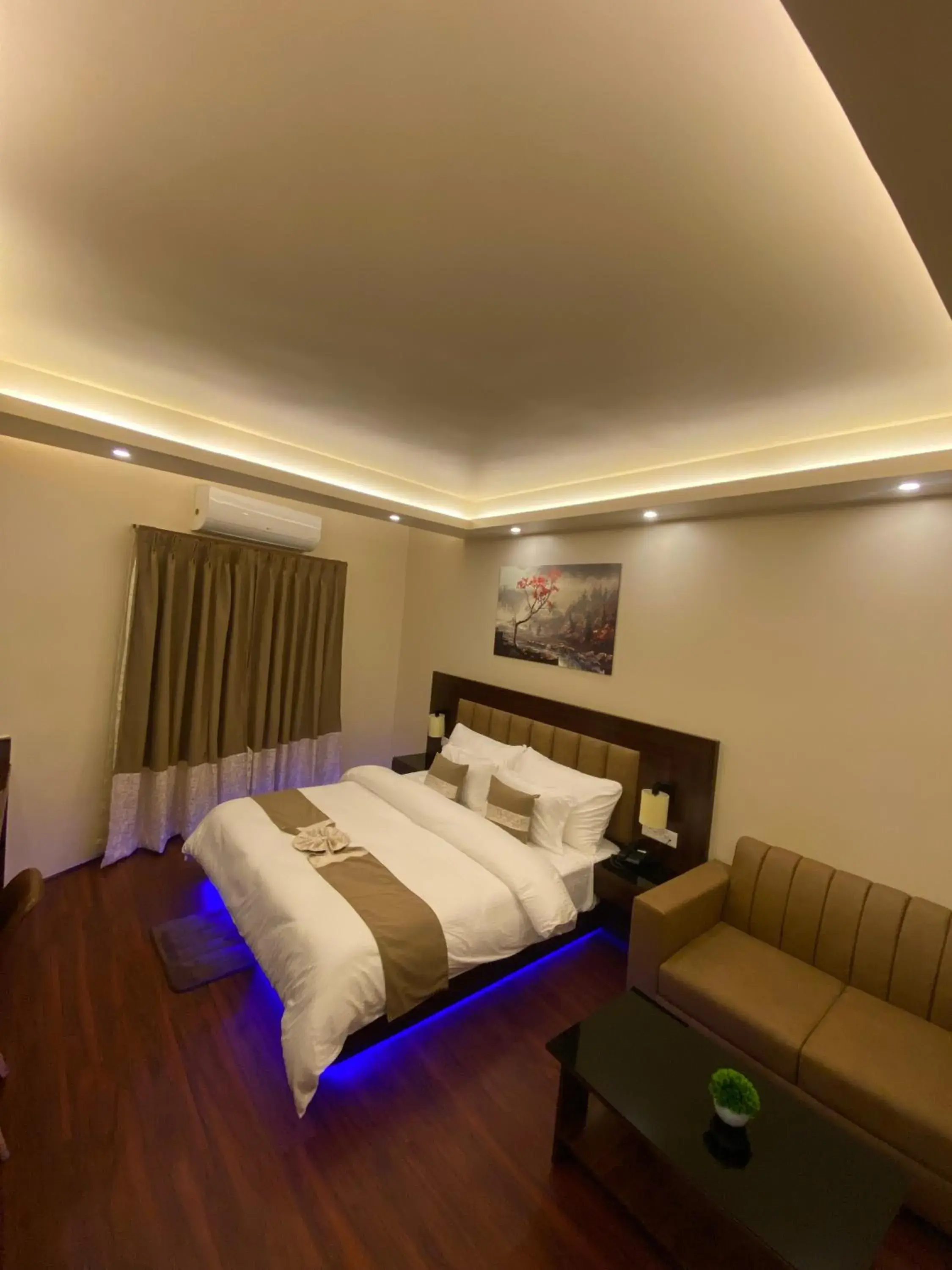 Photo of the whole room, Bed in XCELSIOR HOTEL & SPA Photo of the whole room, Bed in XCELSIOR HOTEL & SPA