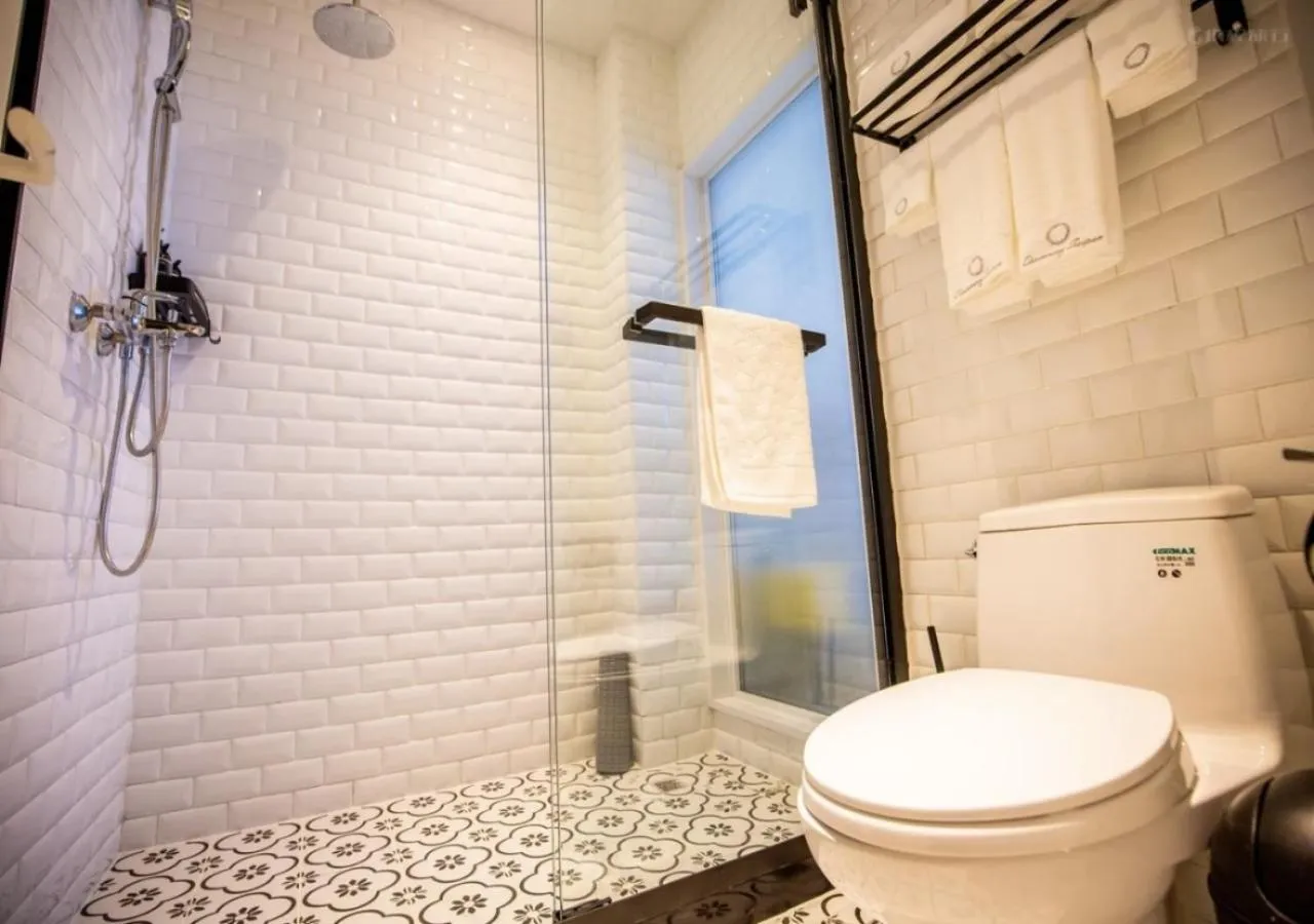 Toilet in Discovery Saipan Hotel