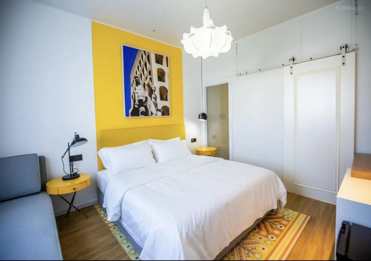 Bedroom, Bed in Discovery Saipan Hotel