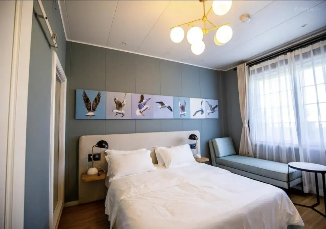 Bedroom, Bed in Discovery Saipan Hotel Bedroom, Bed in Discovery Saipan Hotel