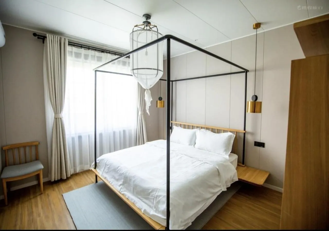 Bedroom, Bed in Discovery Saipan Hotel