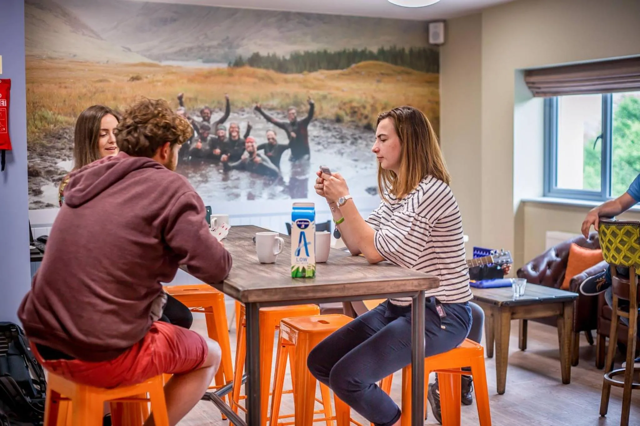 Communal lounge/ TV room in Wild Atlantic Hostel