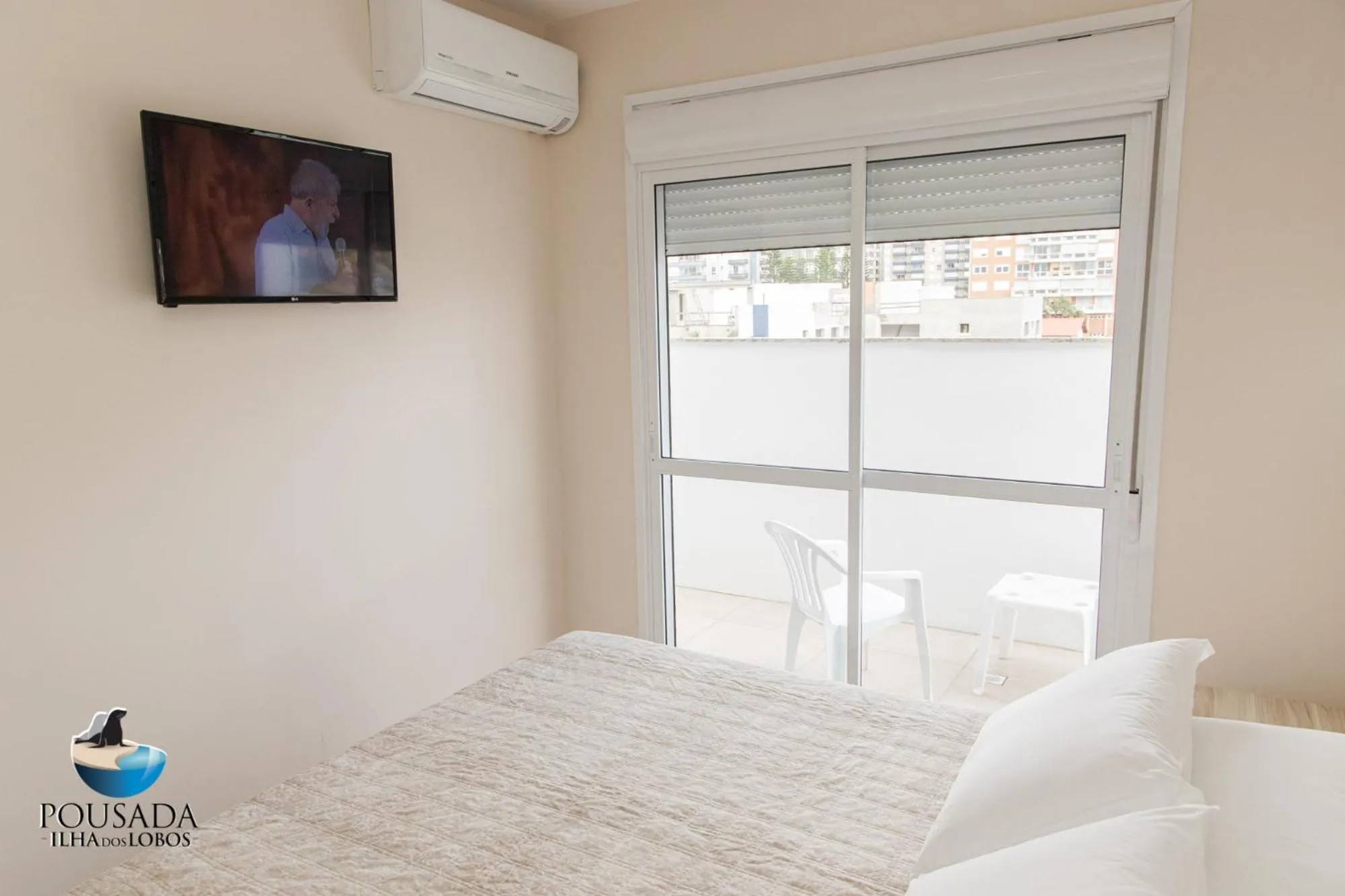 Photo of the whole room, Bed in Pousada Ilha dos Lobos