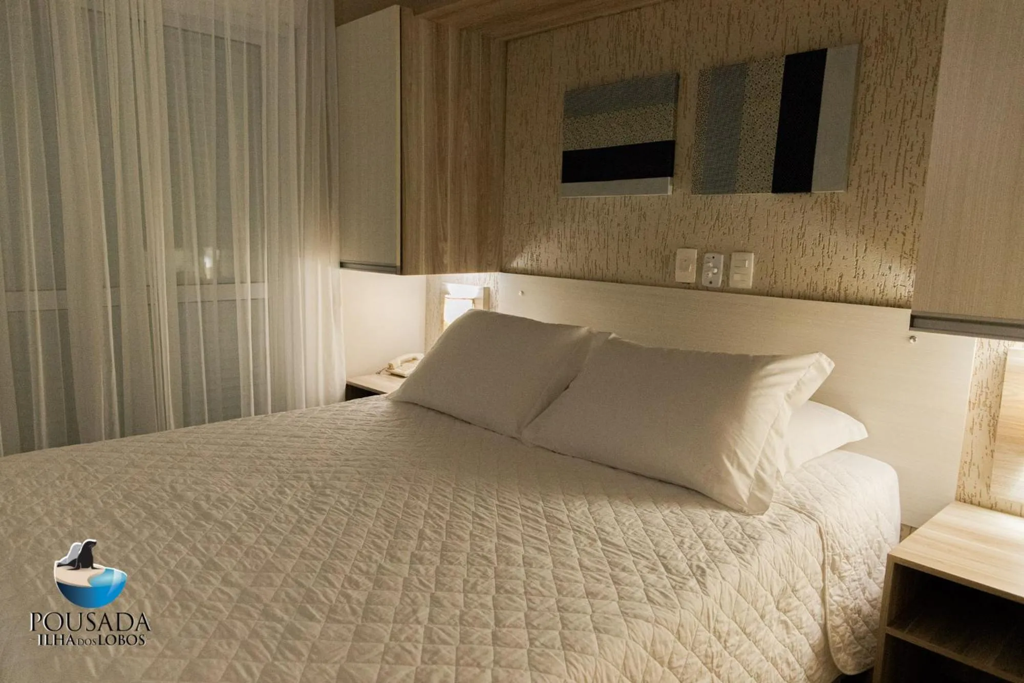 Bed in Pousada Ilha dos Lobos