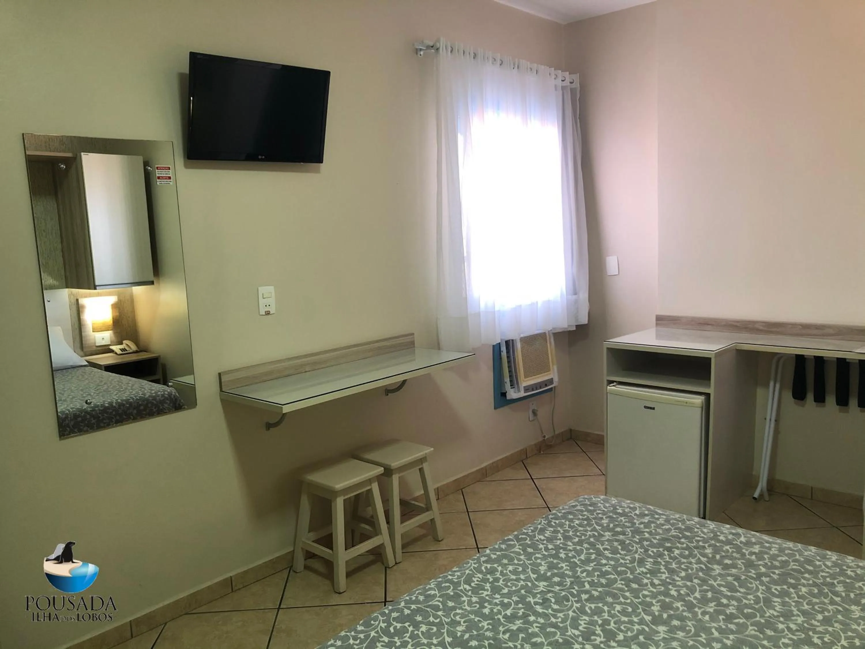 Photo of the whole room in Pousada Ilha dos Lobos