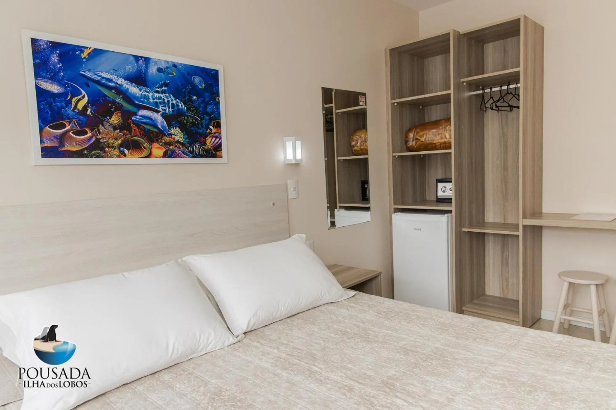 Photo of the whole room, Bed in Pousada Ilha dos Lobos
