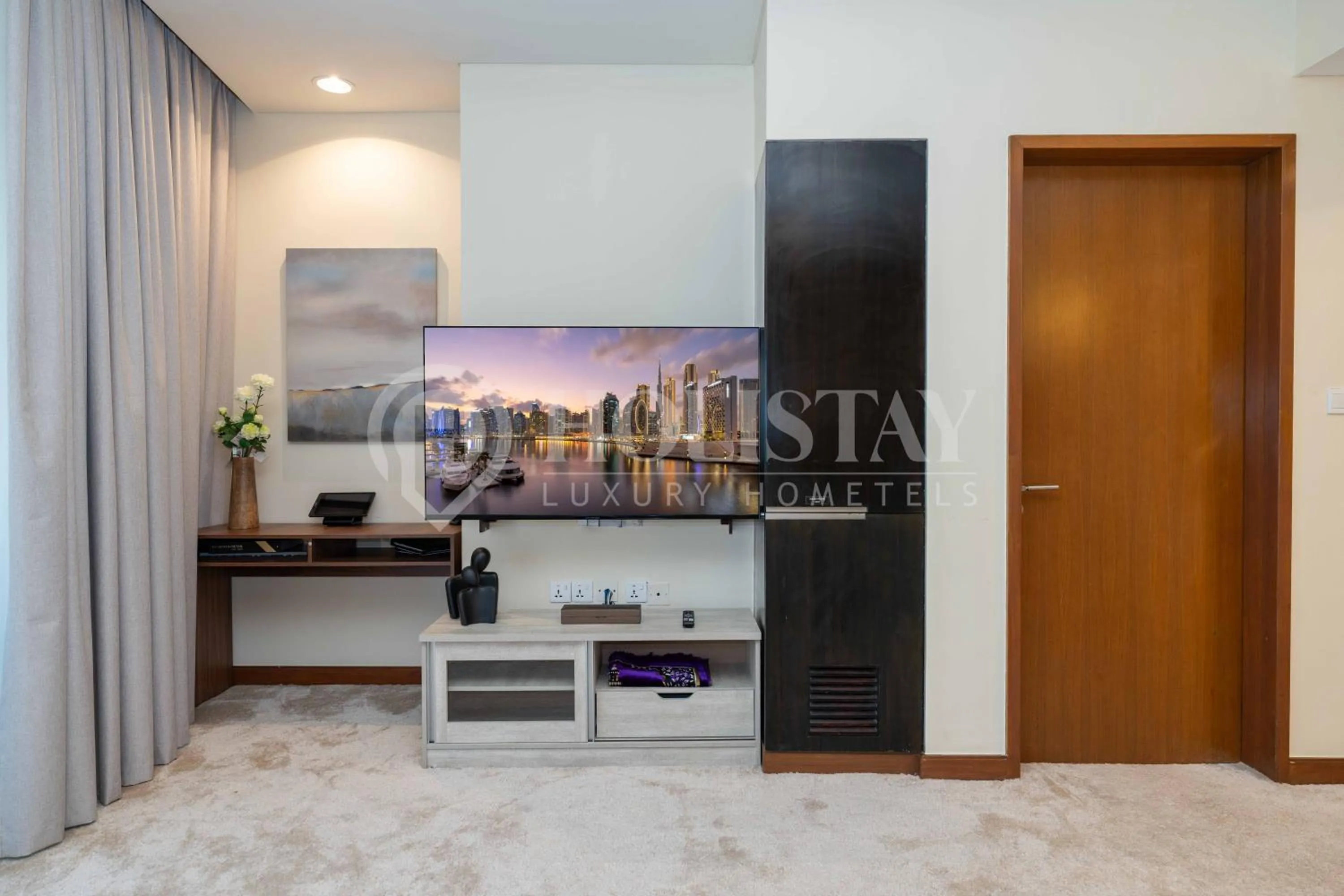 TV and multimedia in Holistay Luxury Homes - Burj khalifa view - Direct Access Dubai Mall