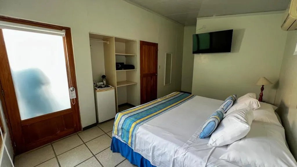 Bedroom, Bed in Punta Sal Suites & Bungalows Resort