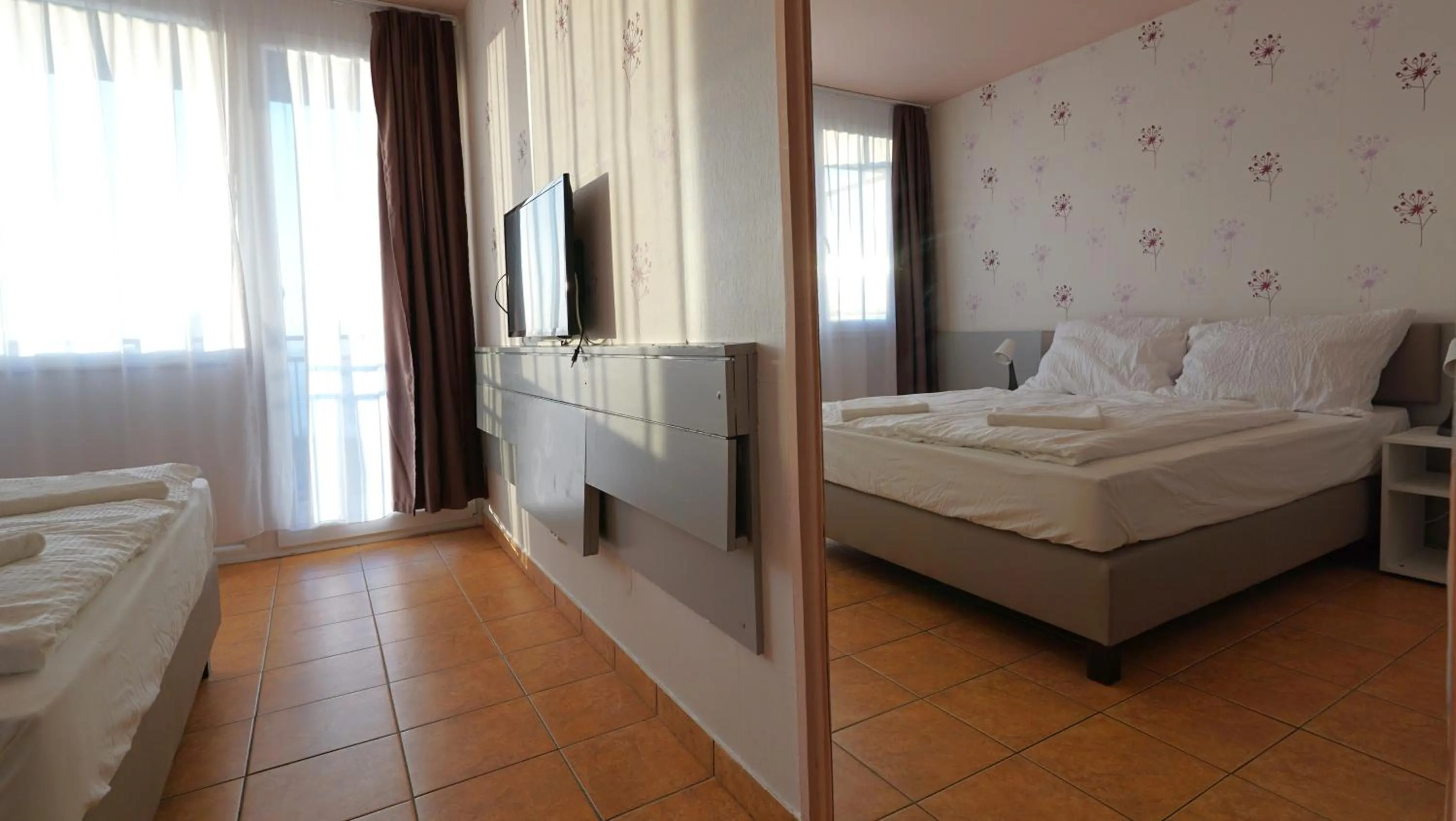 Photo of the whole room, Bed in Plazs Hotel Siófok