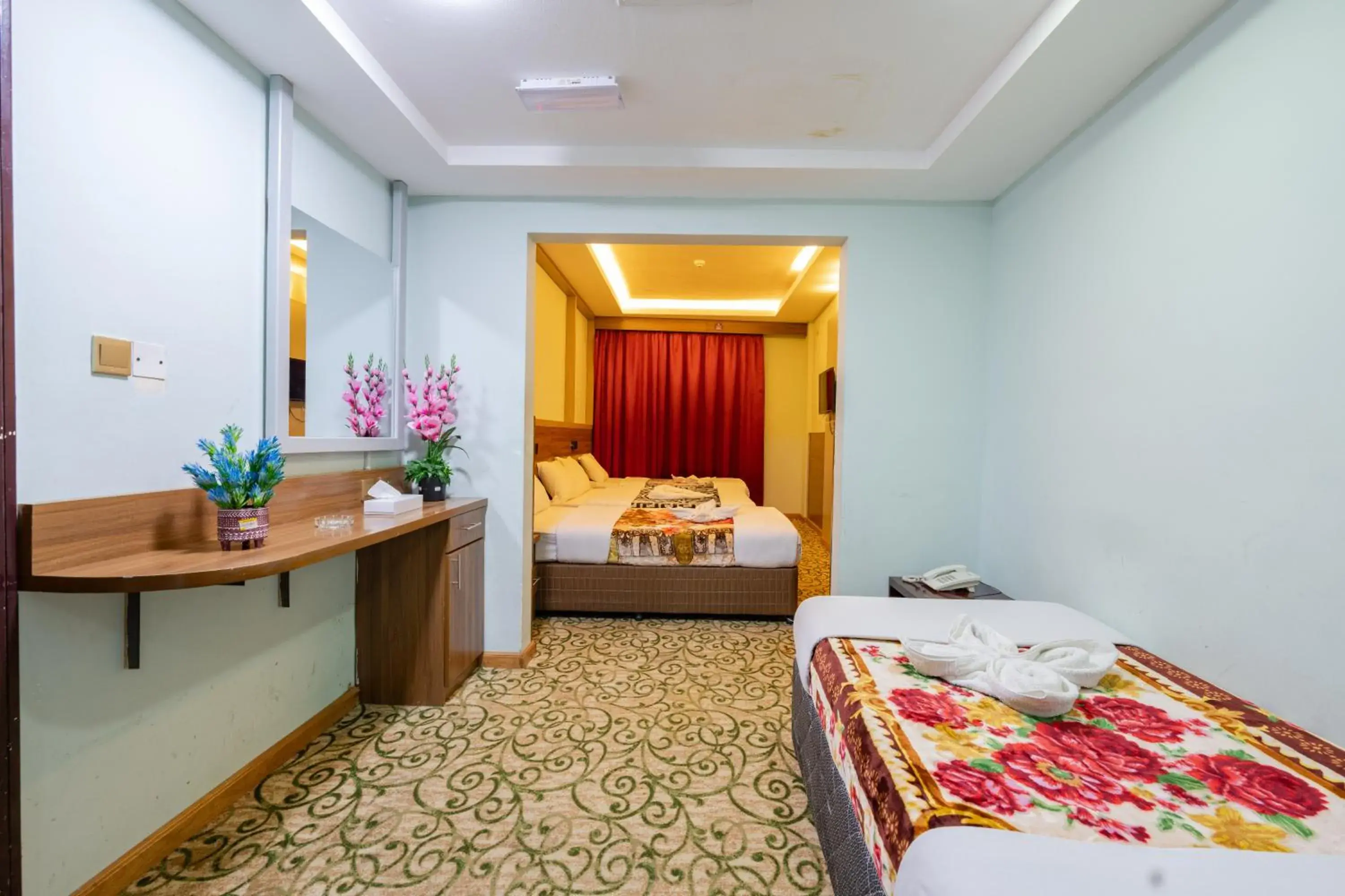 Bed in Tanha Hotel Bed in Tanha Hotel