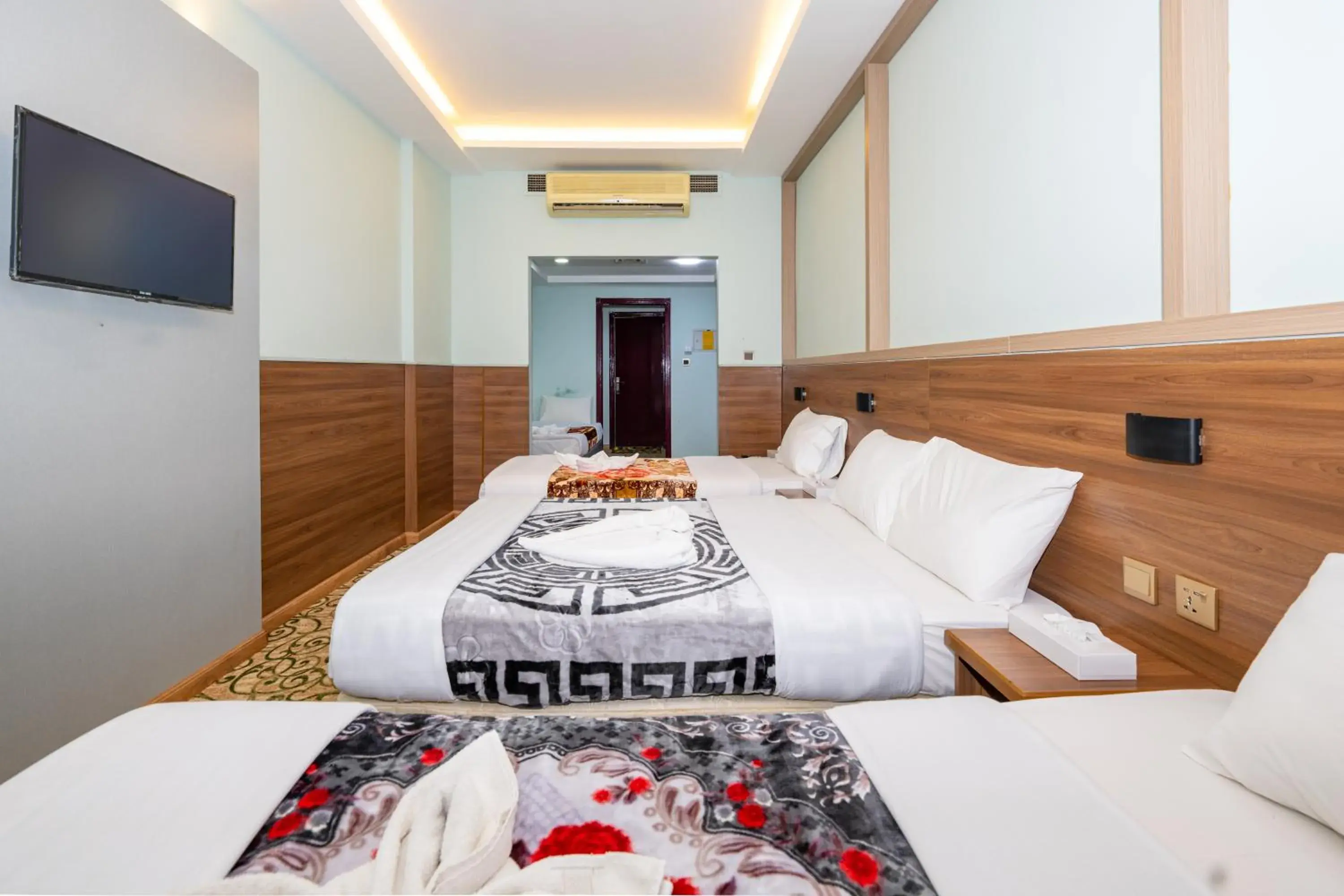 Bed in Tanha Hotel Bed in Tanha Hotel