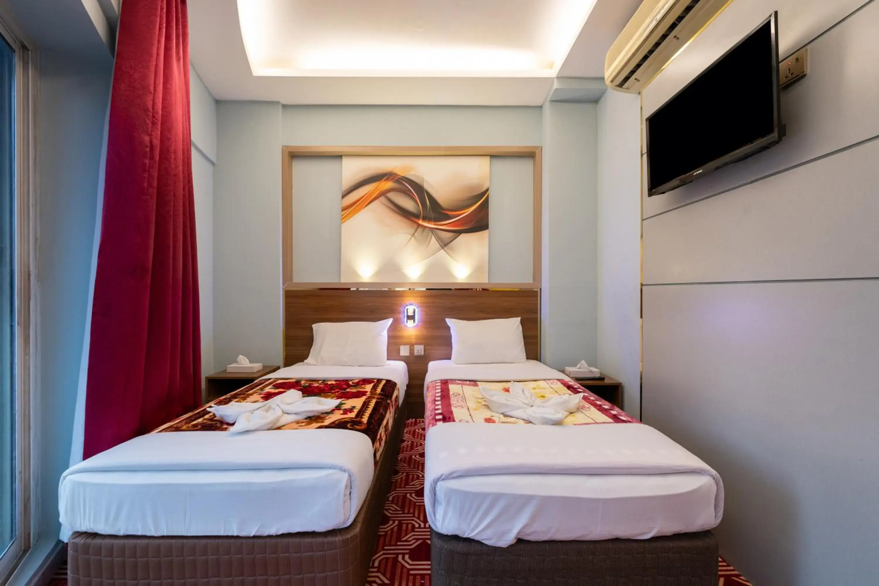 Bed in Tanha Hotel Bed in Tanha Hotel