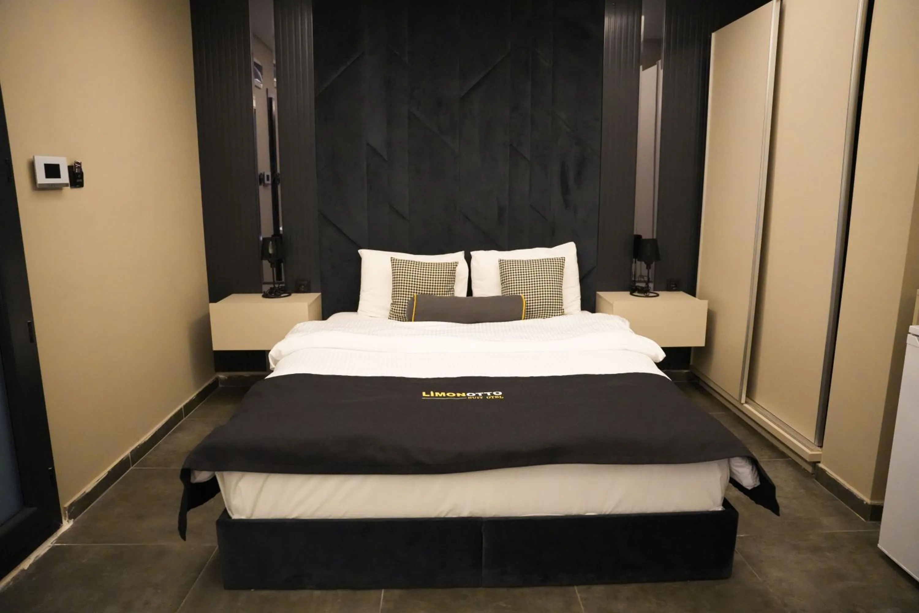 Bed in LİMONOTTO SUİT OTEL