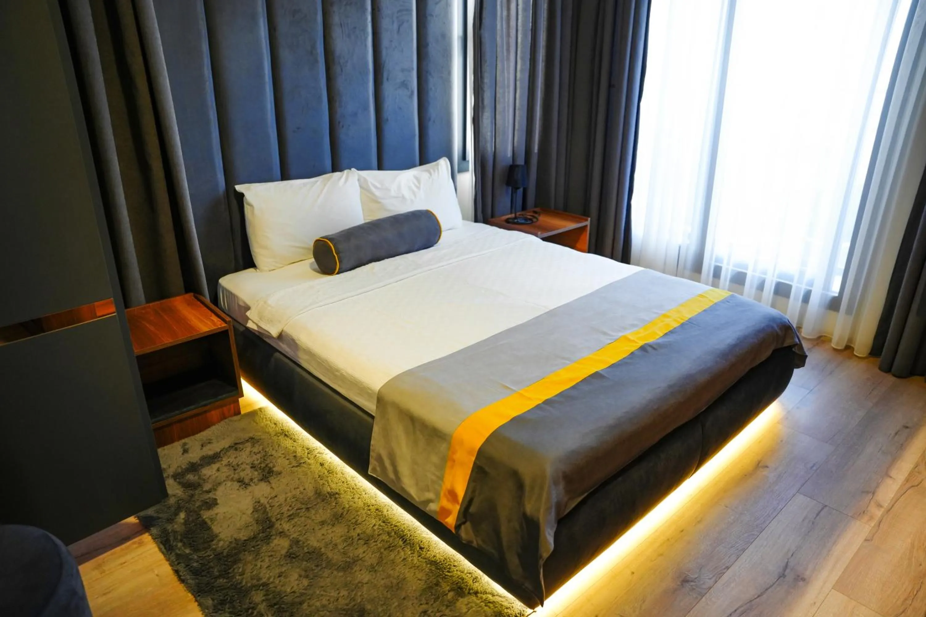 Bed in LİMONOTTO SUİT OTEL