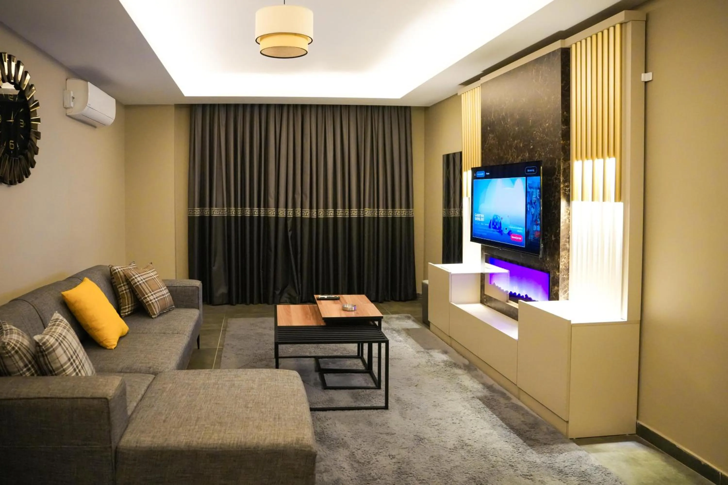 Communal lounge/ TV room in LİMONOTTO SUİT OTEL