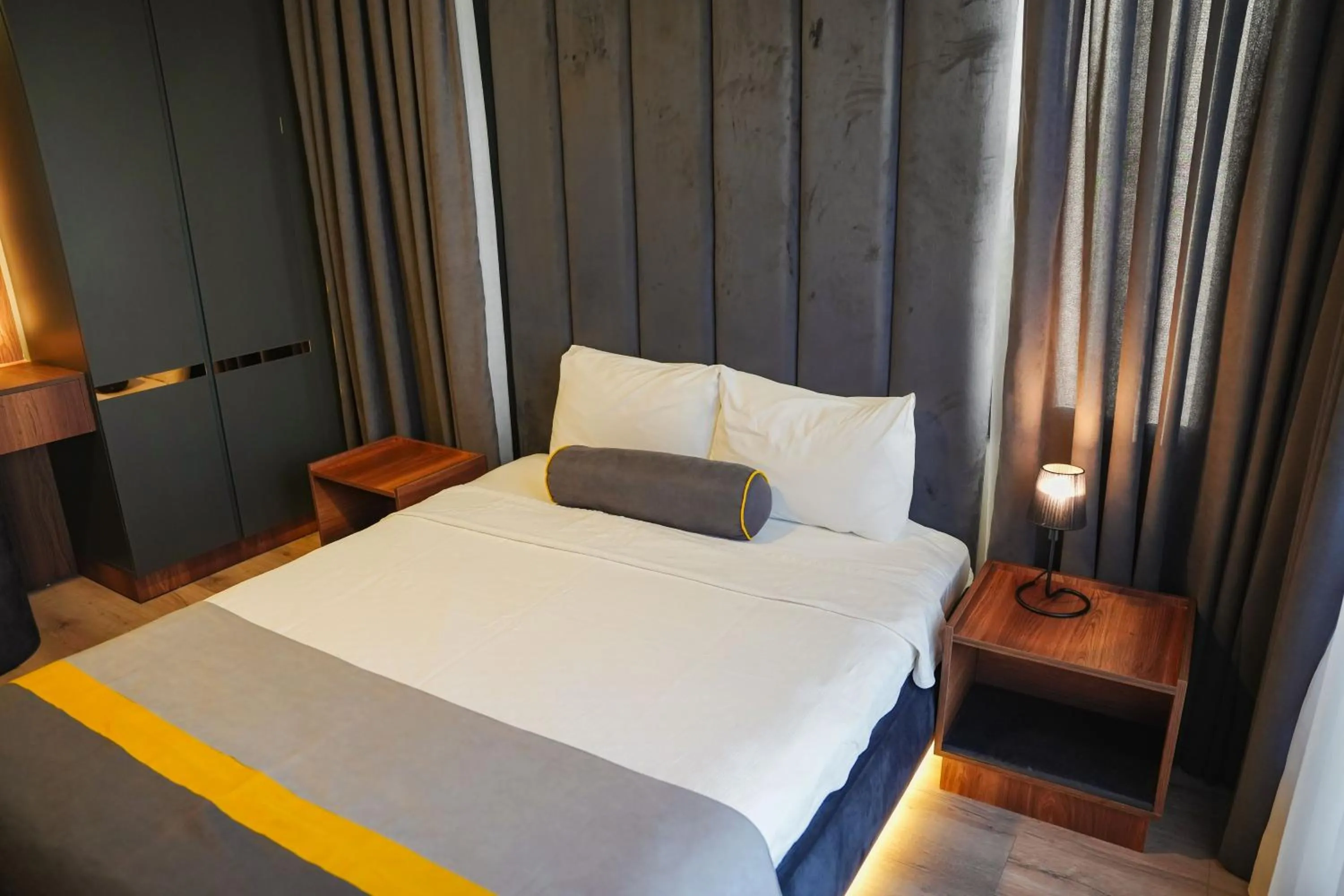 Bed in LİMONOTTO SUİT OTEL