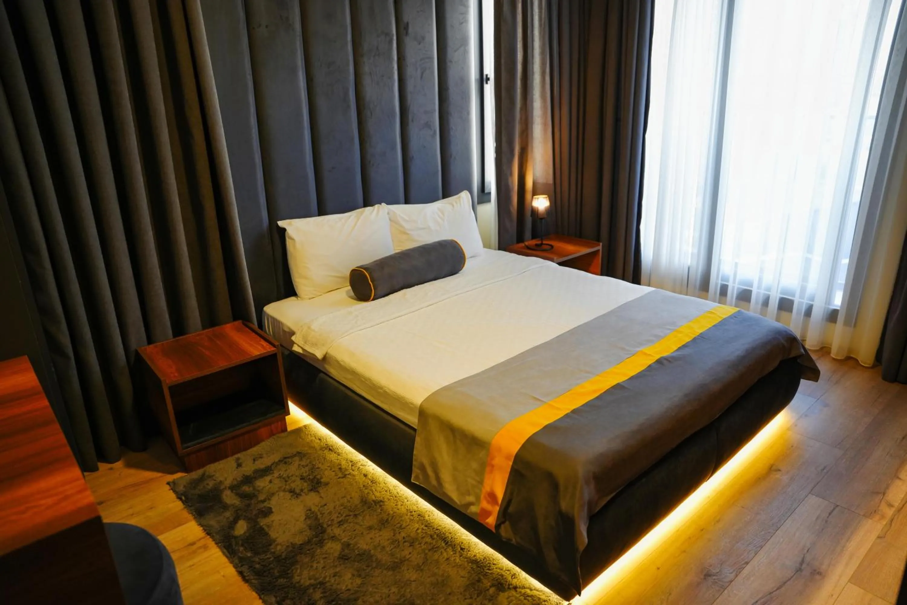 Bed in LİMONOTTO SUİT OTEL