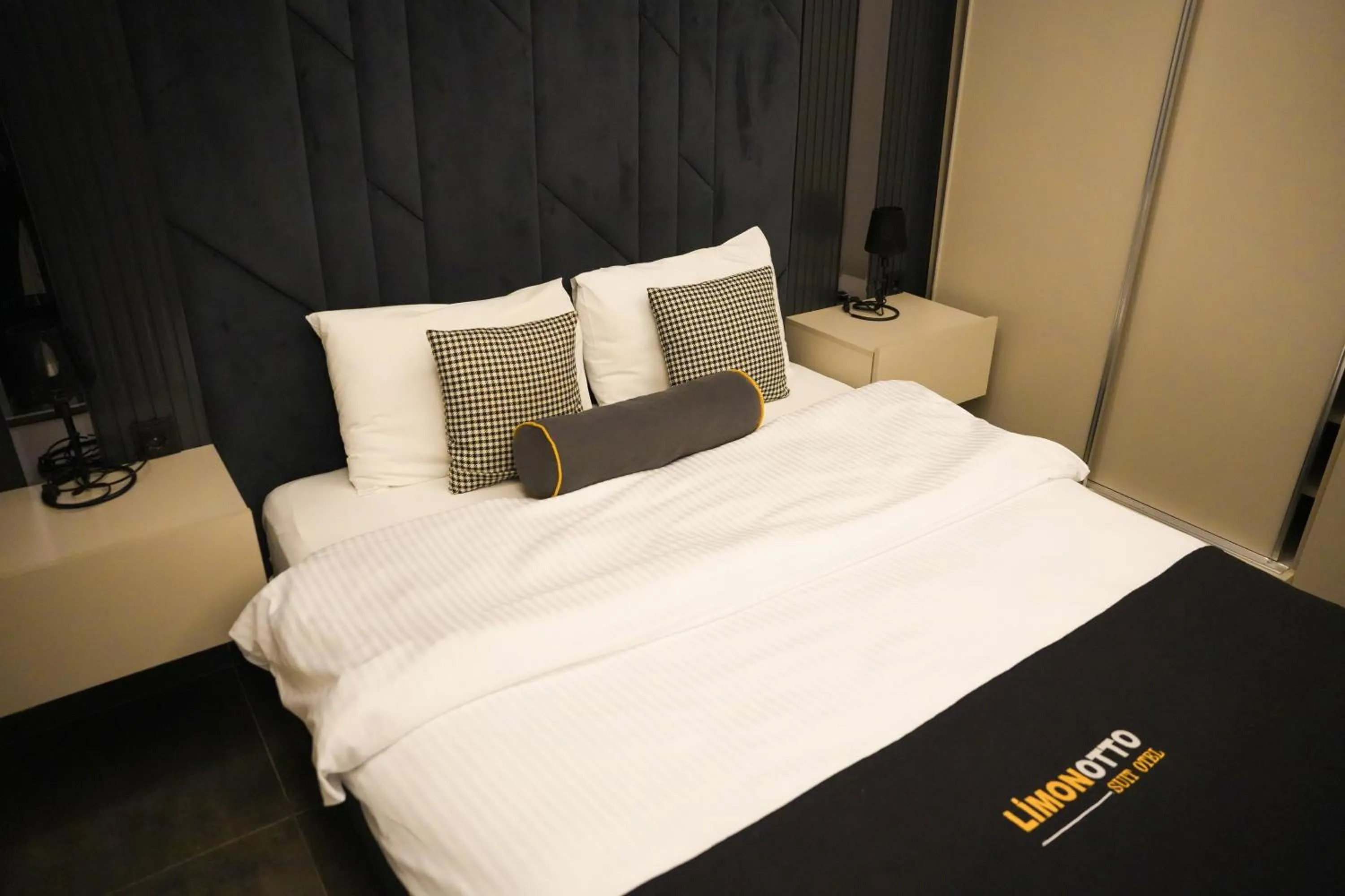 Bed in LİMONOTTO SUİT OTEL