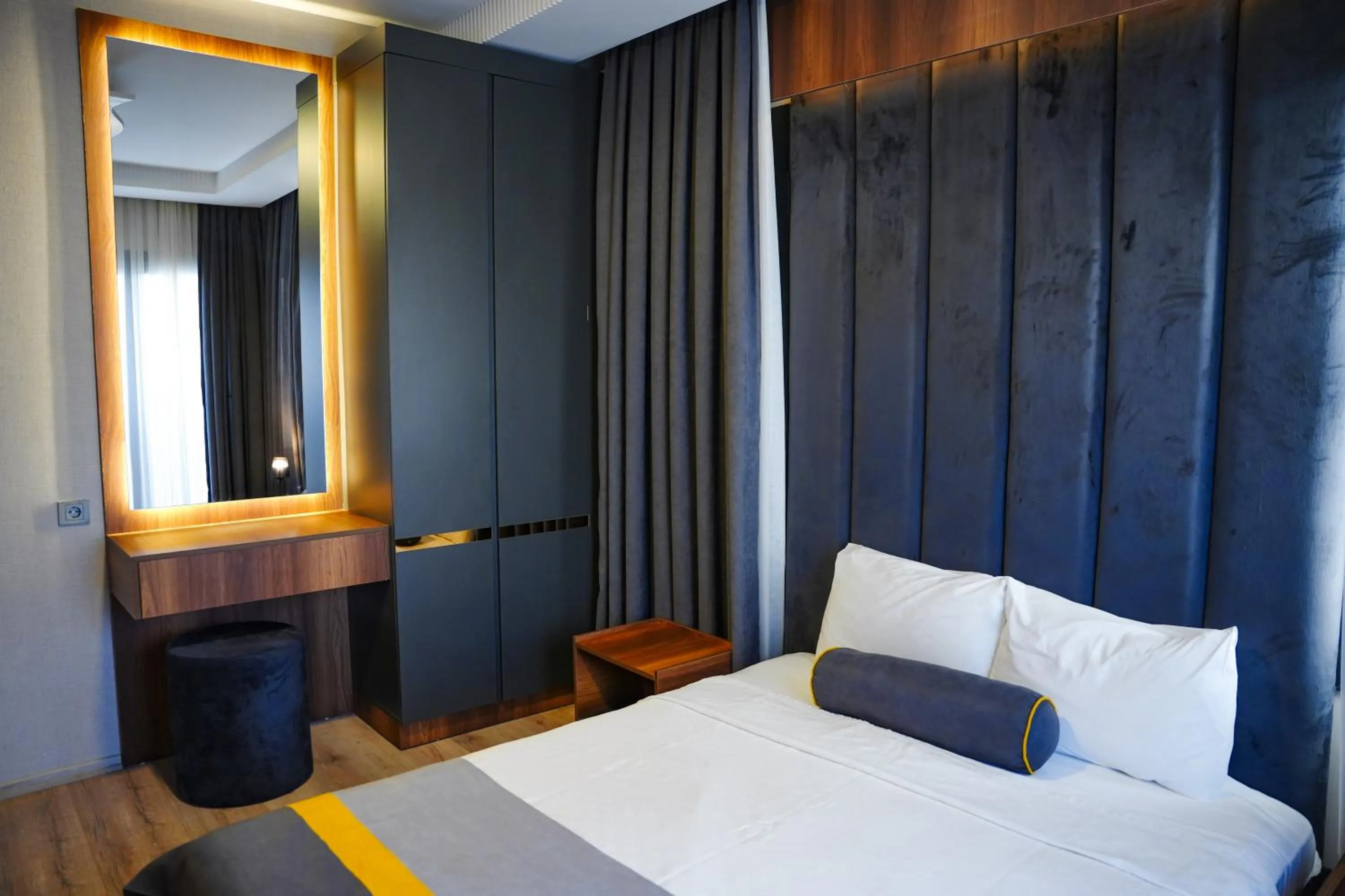 Bed in LİMONOTTO SUİT OTEL
