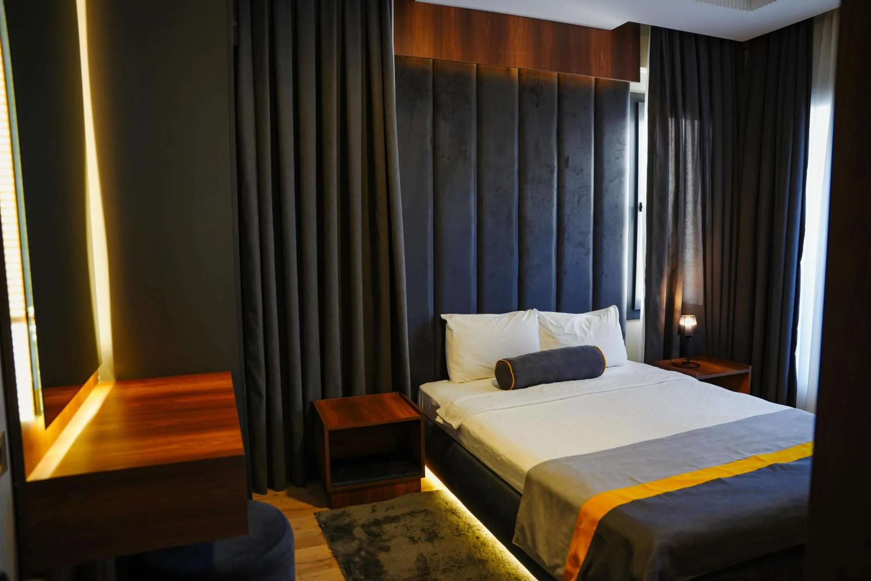 Bed in LİMONOTTO SUİT OTEL
