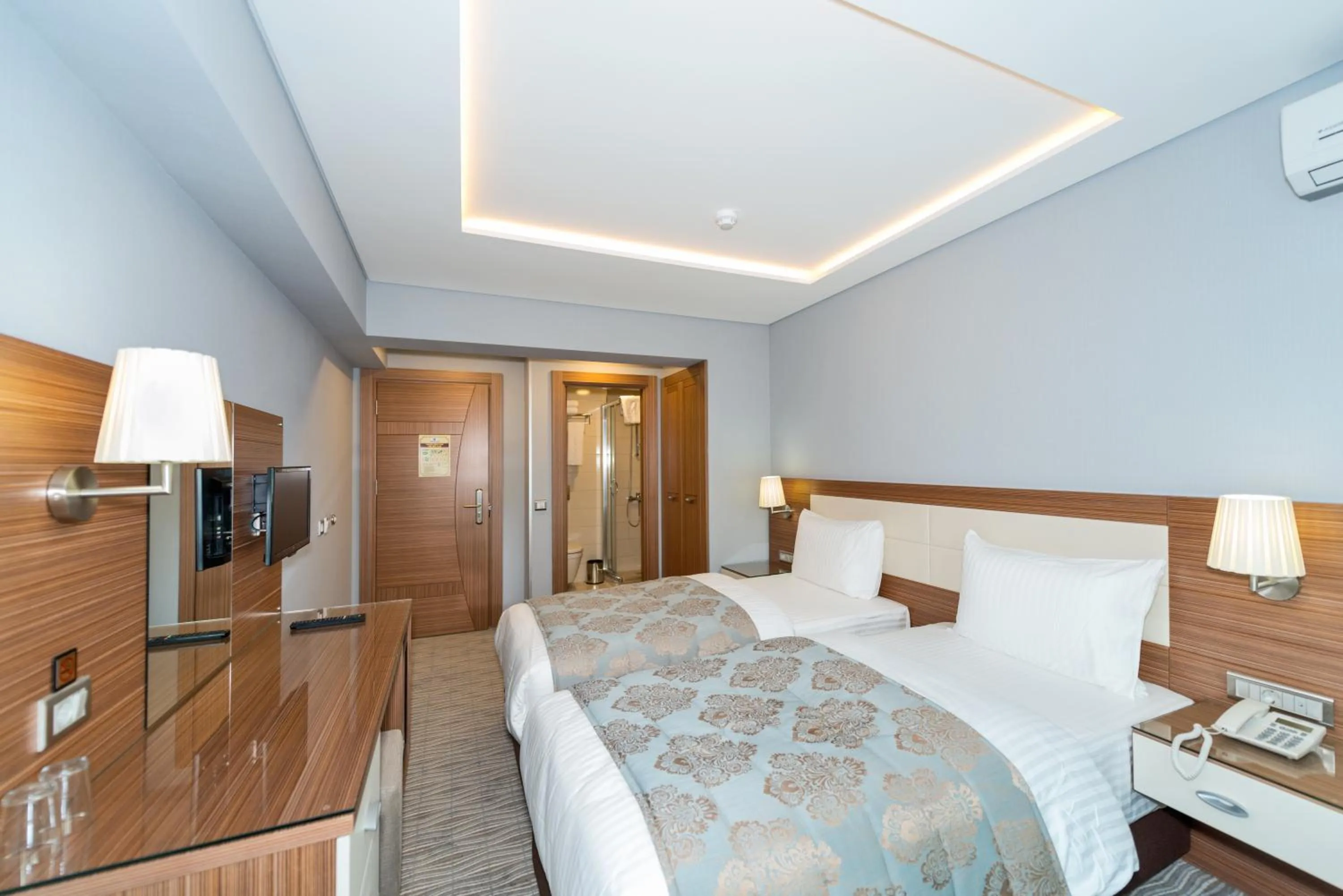 Bed in Floransa City Hotel