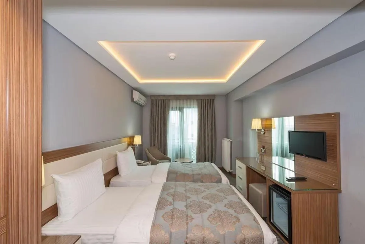 Bed in Floransa City Hotel