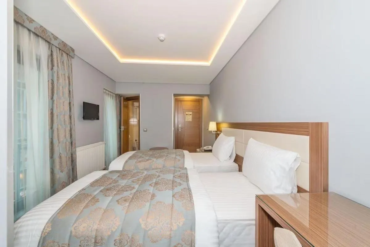 Bed in Floransa City Hotel