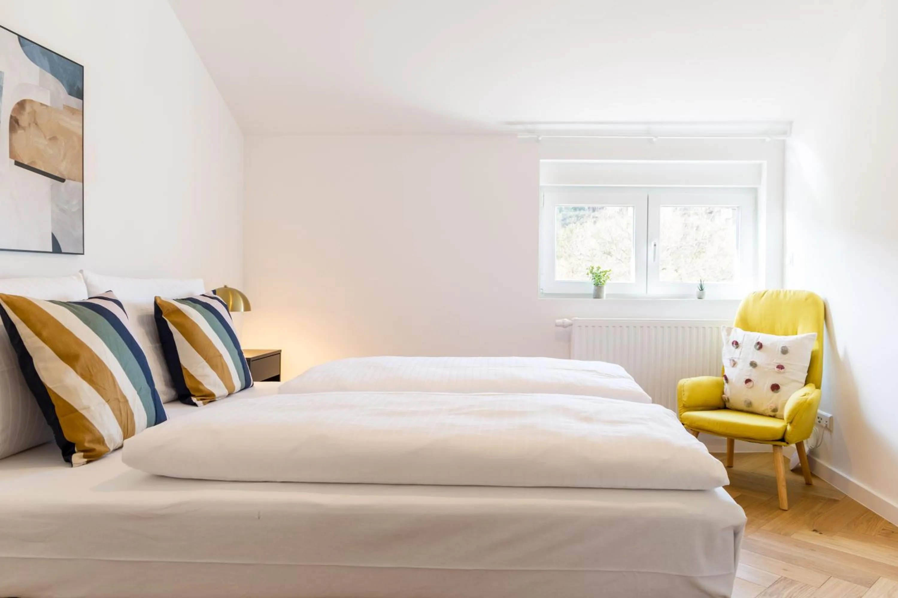 Bed in living TIMELESS - Adler Apartments Sasbachwalden