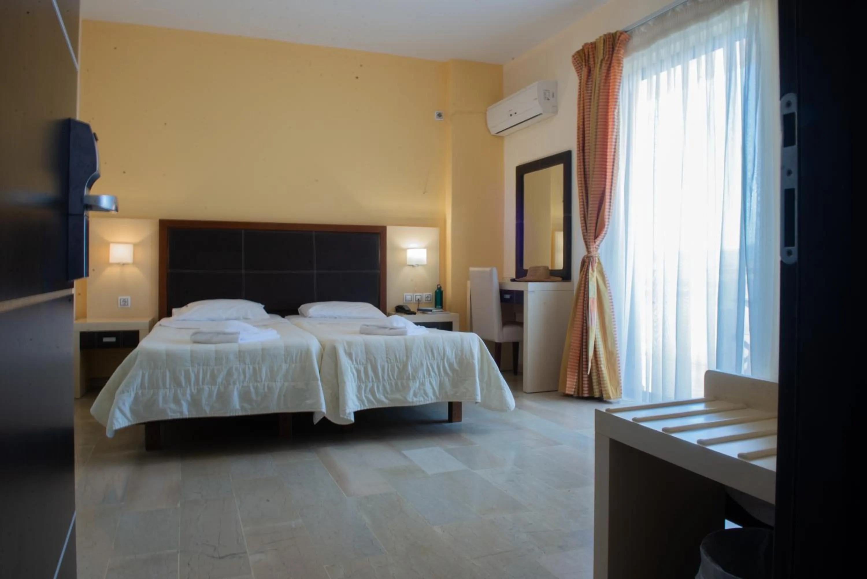 Bed in GOLDEN SUN Κokkoni Beach Hotel