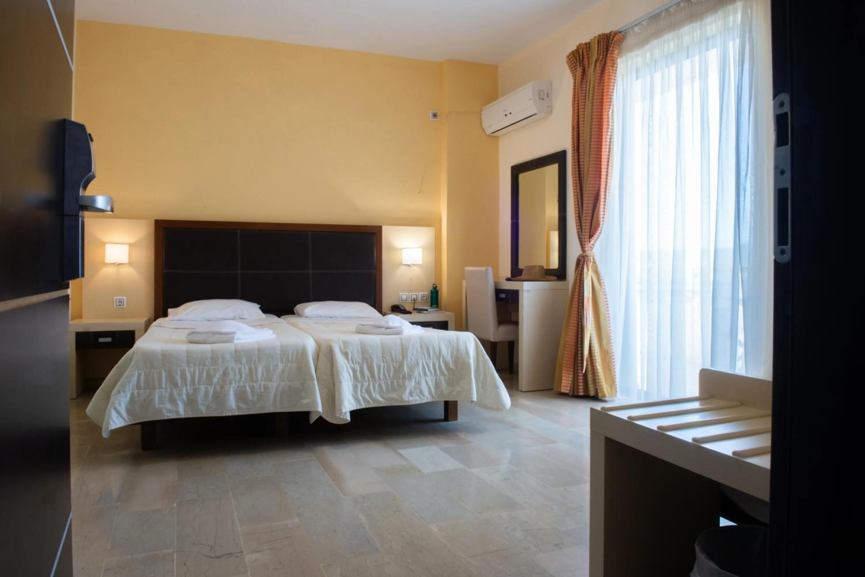 Bed in GOLDEN SUN Κokkoni Beach Hotel