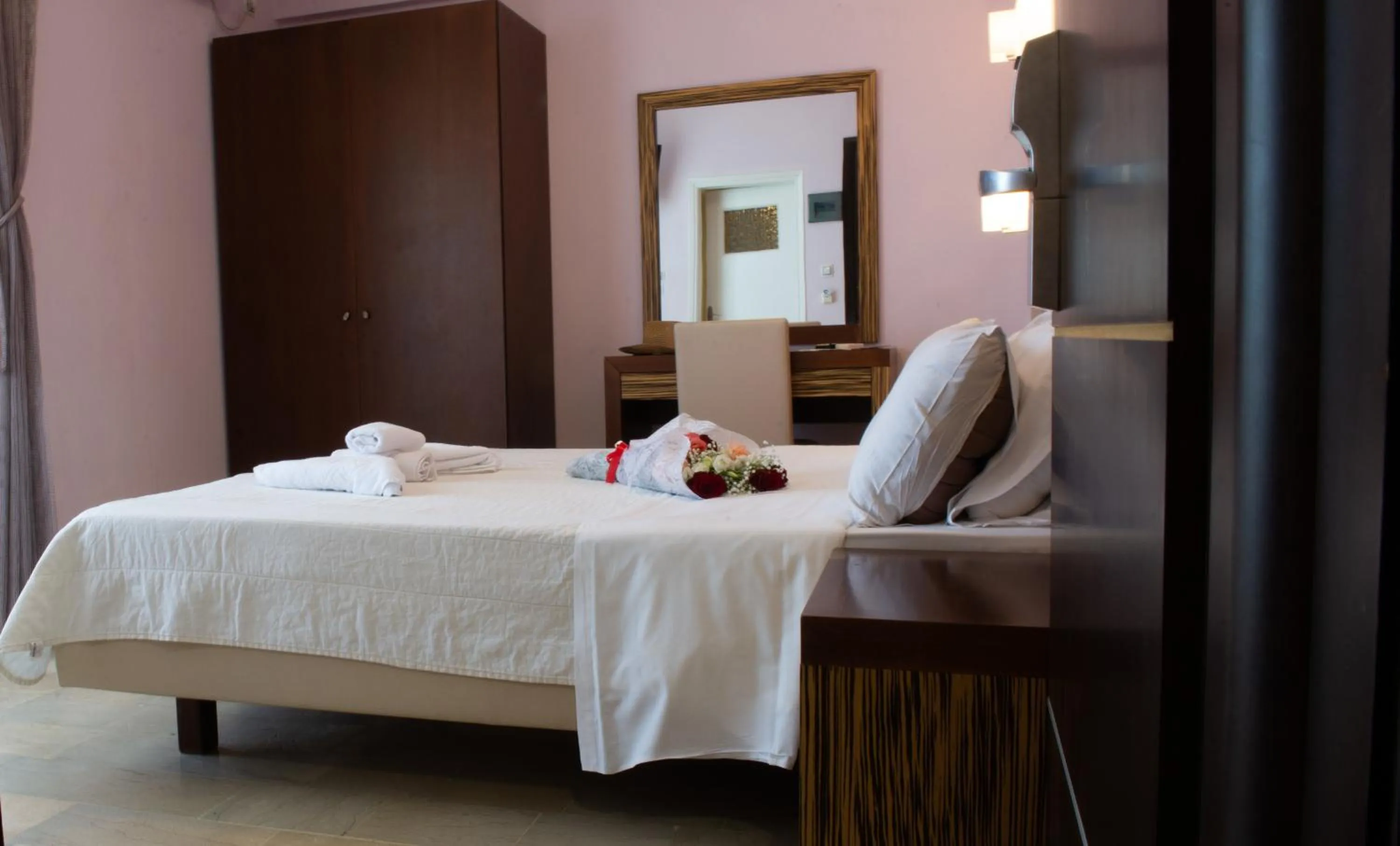 Bed in GOLDEN SUN Κokkoni Beach Hotel