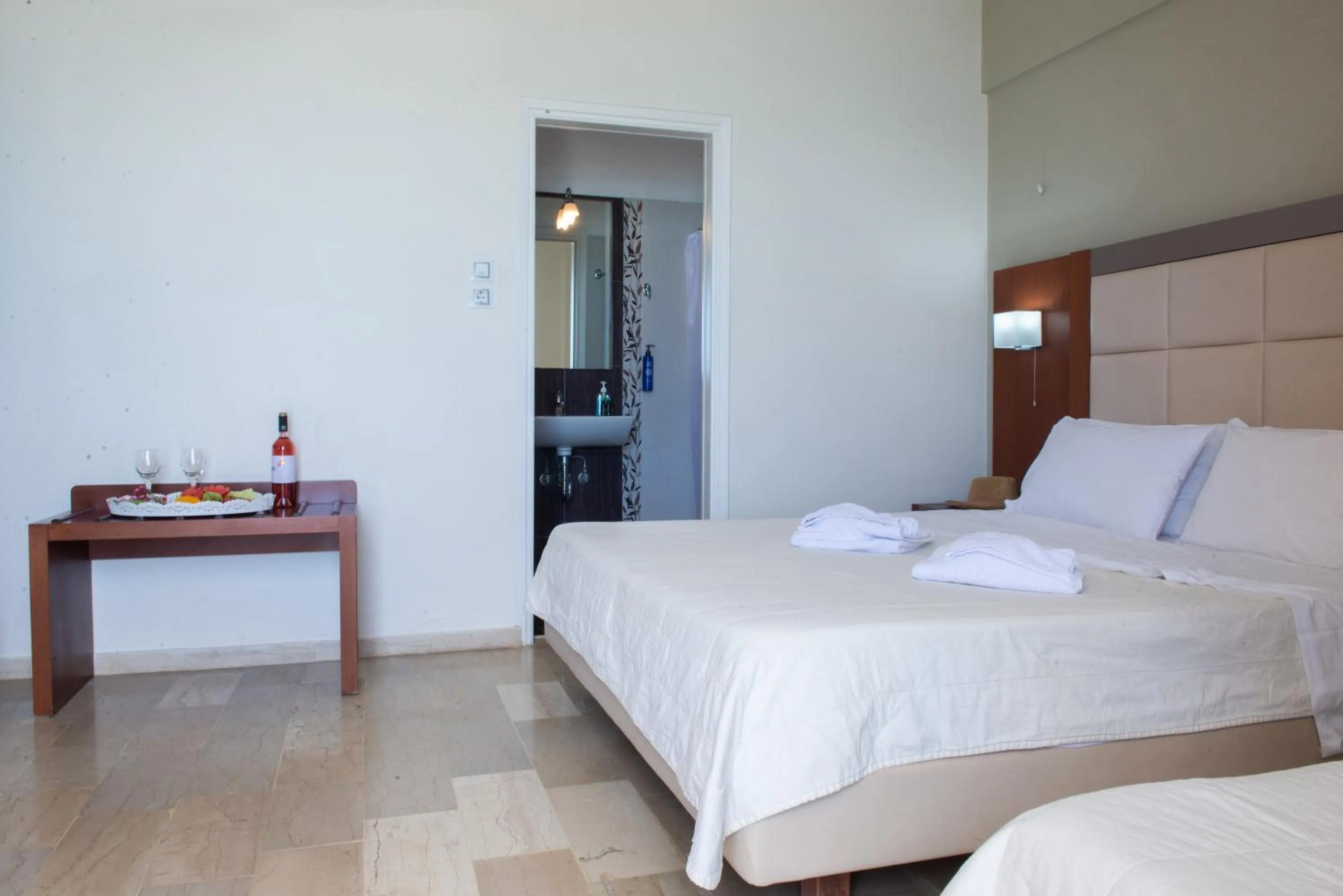 Bed in GOLDEN SUN Κokkoni Beach Hotel