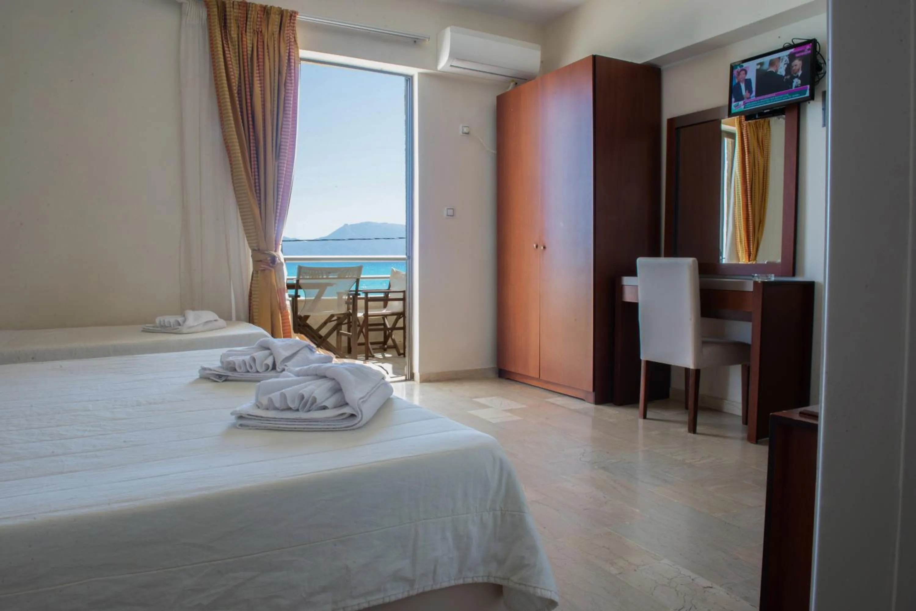 Bed in GOLDEN SUN Κokkoni Beach Hotel