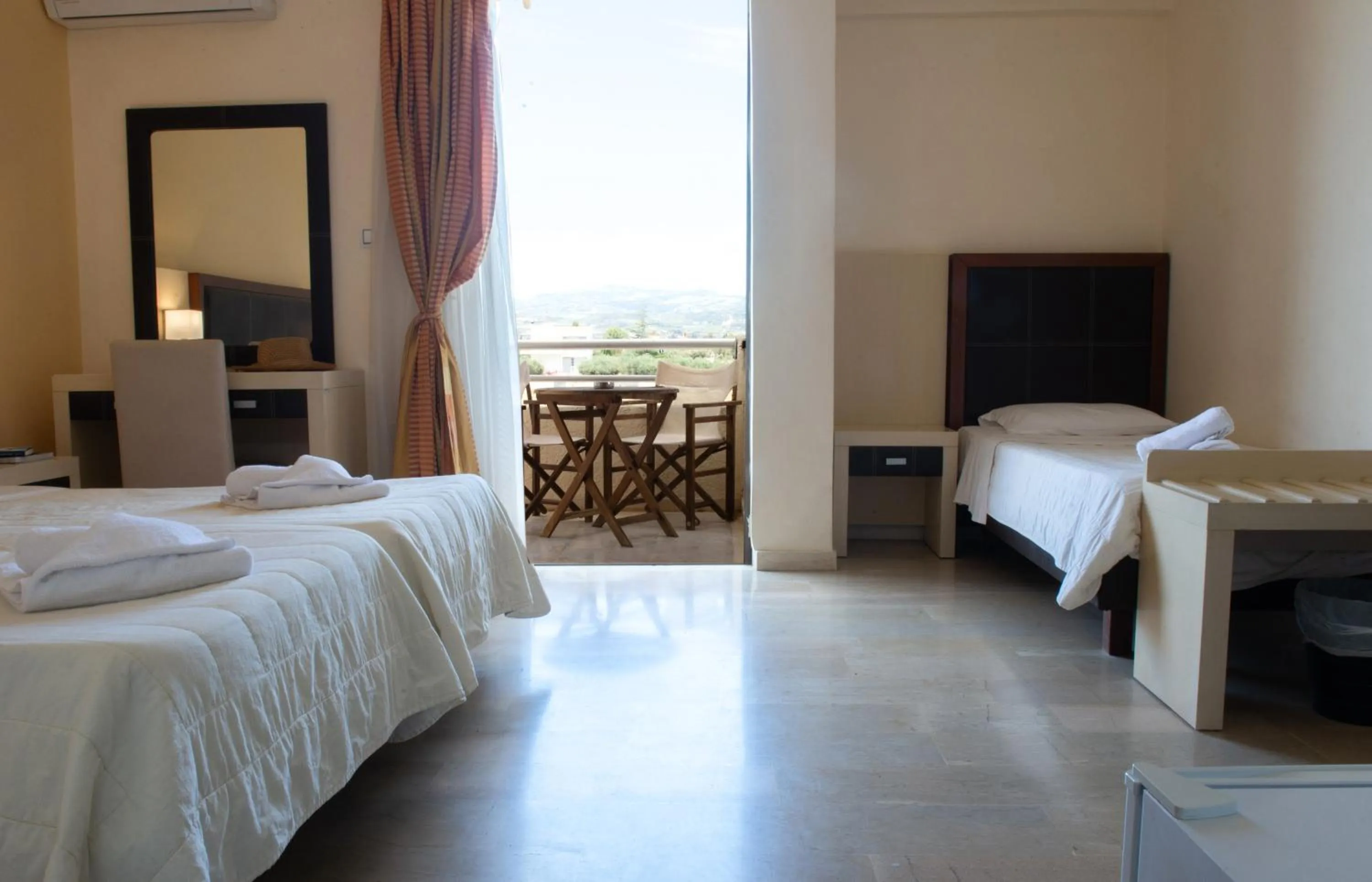 Bed in GOLDEN SUN Κokkoni Beach Hotel