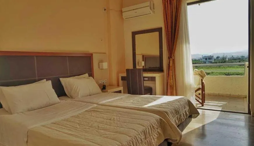 Bed in GOLDEN SUN Κokkoni Beach Hotel