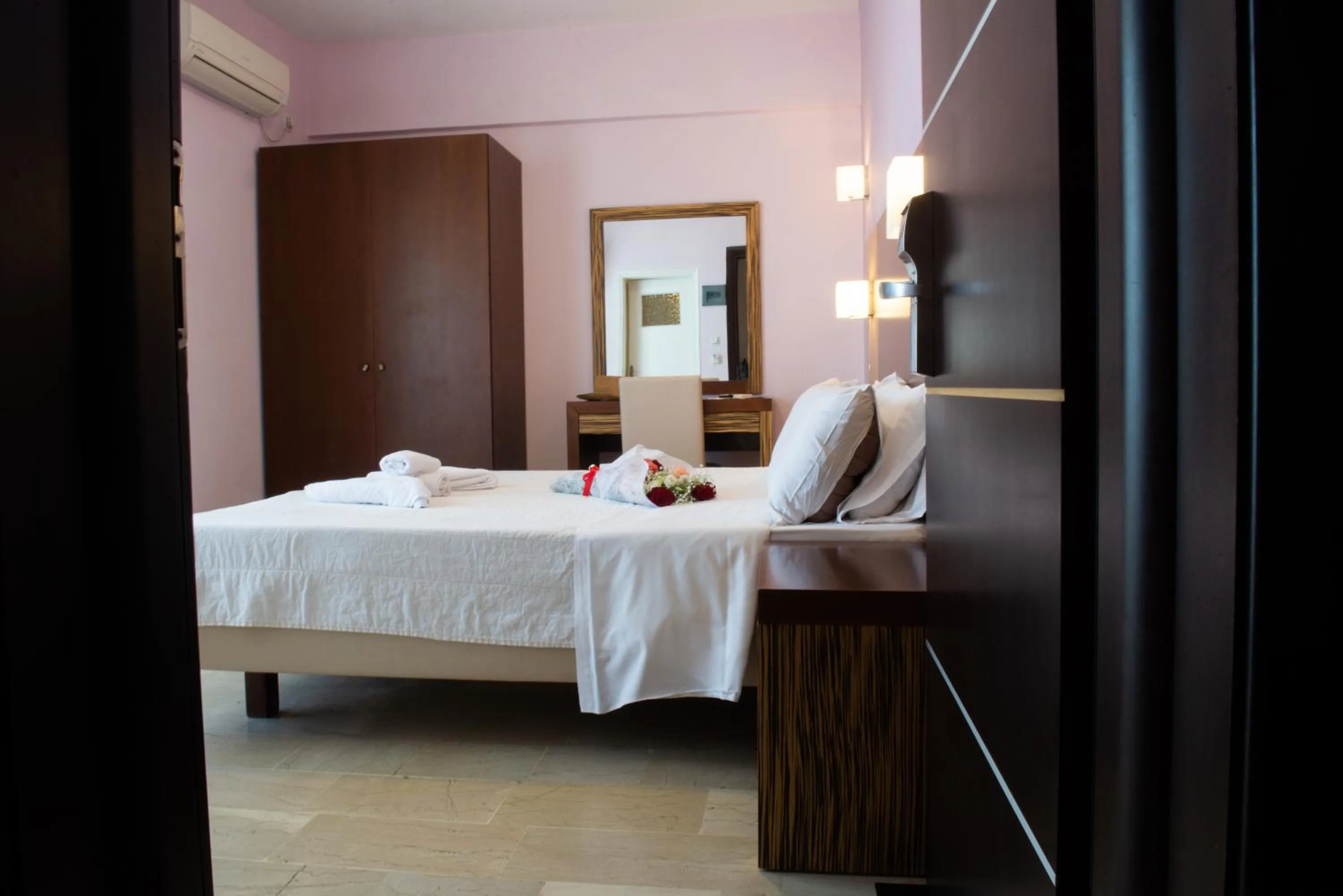 Bed in GOLDEN SUN Κokkoni Beach Hotel