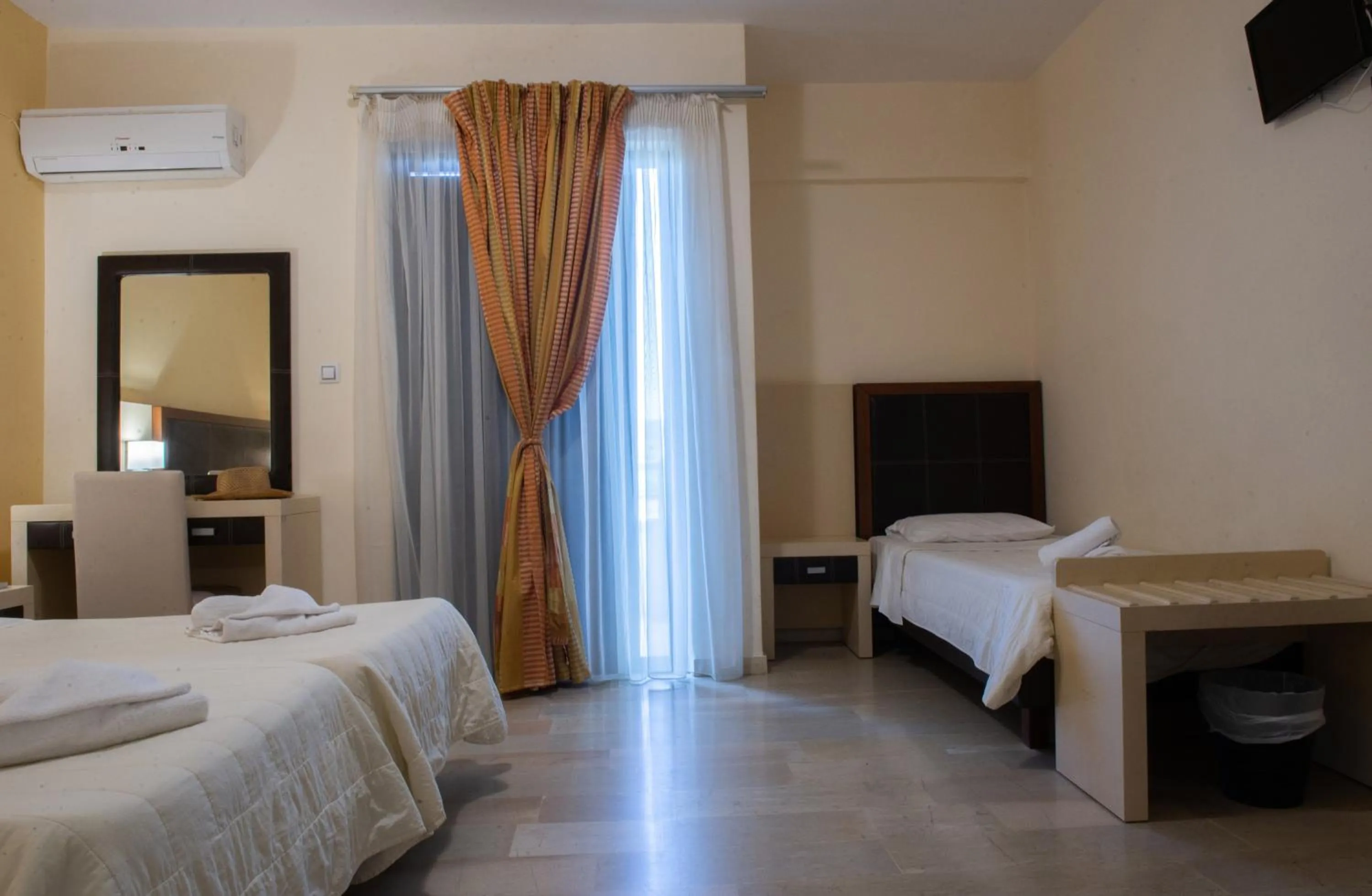 Bed in GOLDEN SUN Κokkoni Beach Hotel