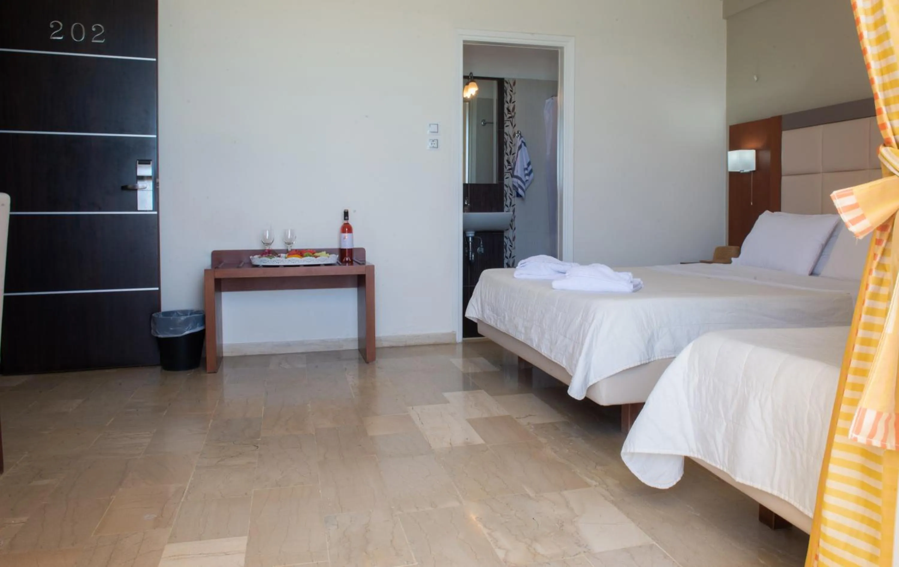 Bed in GOLDEN SUN Κokkoni Beach Hotel