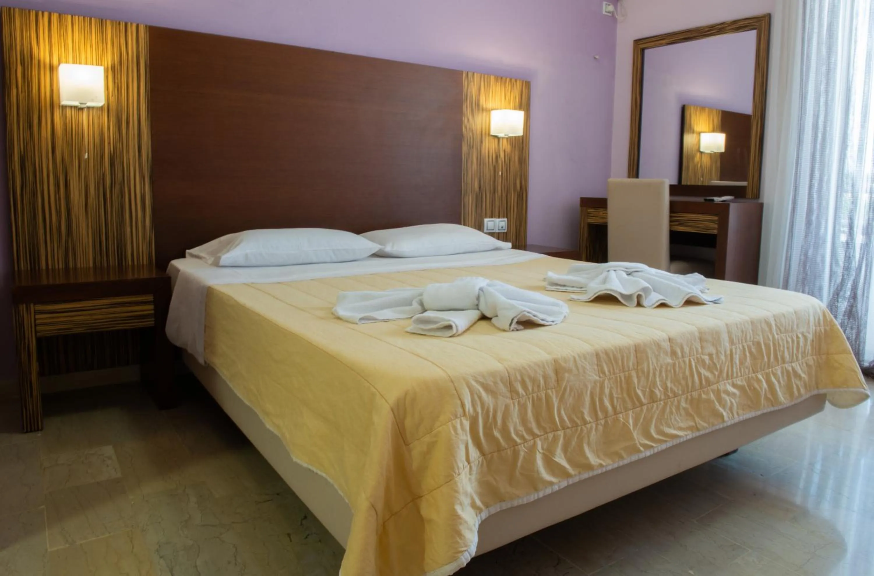 Bed in GOLDEN SUN Κokkoni Beach Hotel