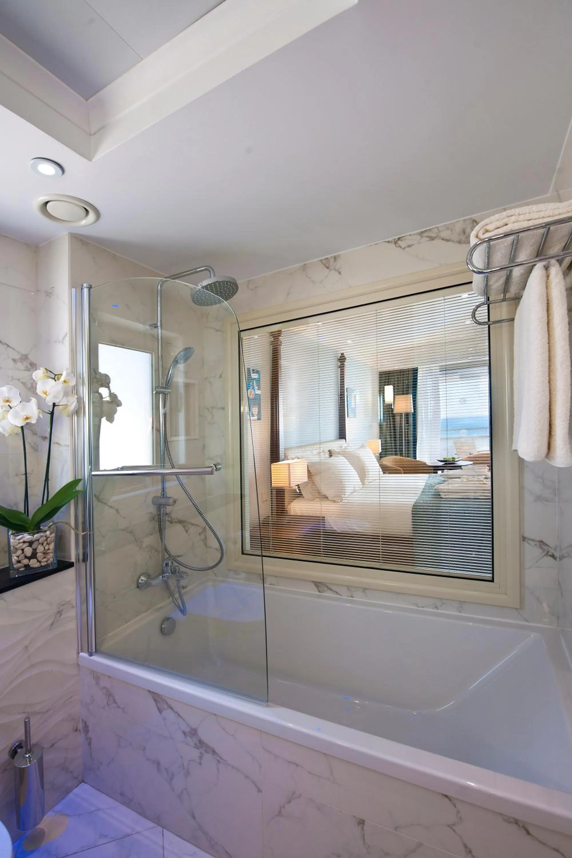 Bathroom, Bed in Olympic Lagoon Resort Paphos